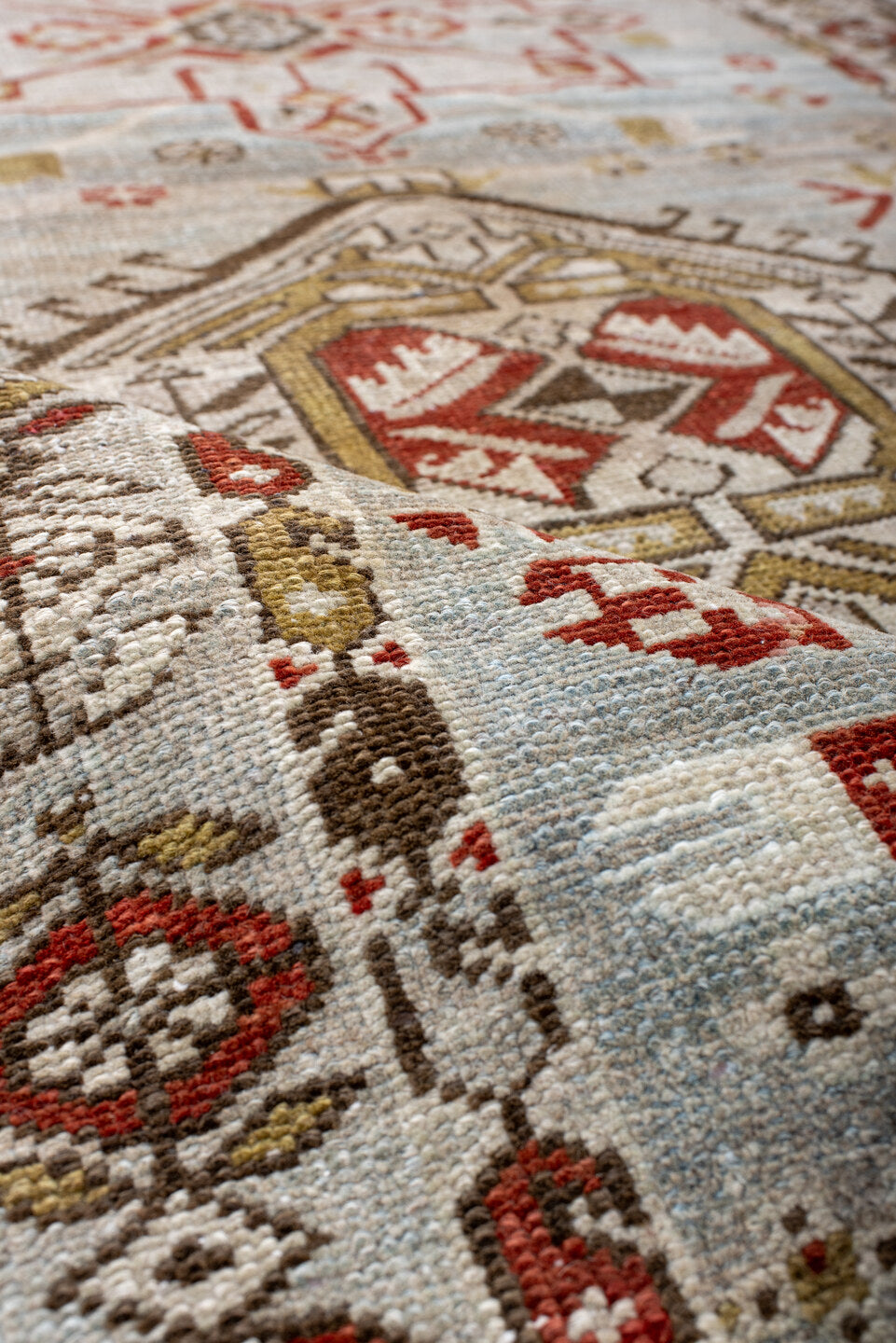 3' x 17' one-of-a-kind handmade antique Heriz runner rug. Color palette: light blue, ivory, rust, brown, camel, gold, taupe