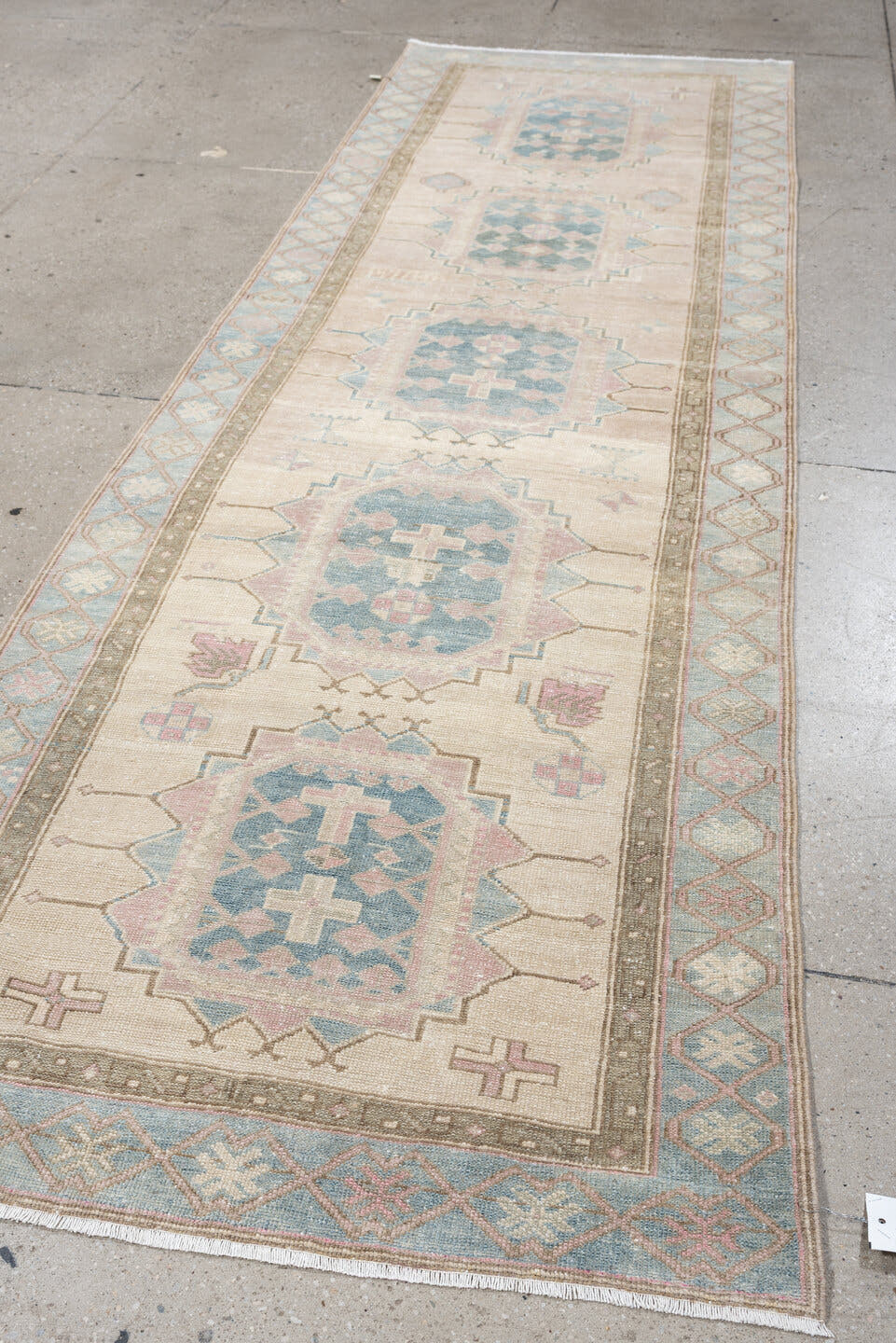3' x 10' one-of-a-kind handmade antique Saraband runner rug. Color palette: ivory, sky blue, blush, taupe, sage, rose