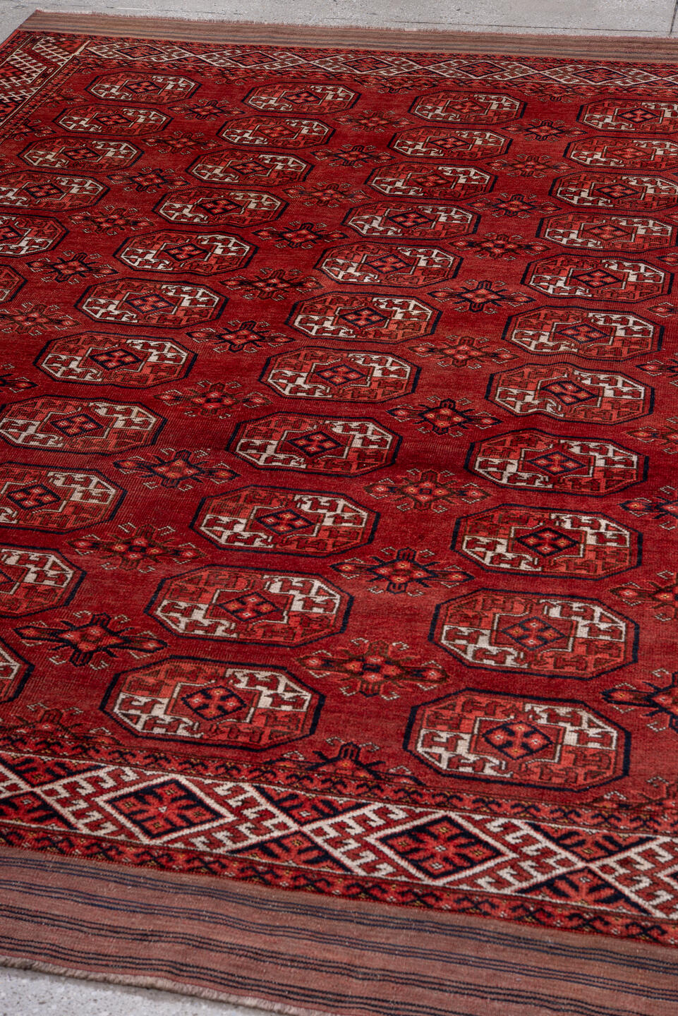 6' x 10' one-of-a-kind handmade vintage Yamoud large size rug. Color palette: black, brown, gray, light gray, pink, red