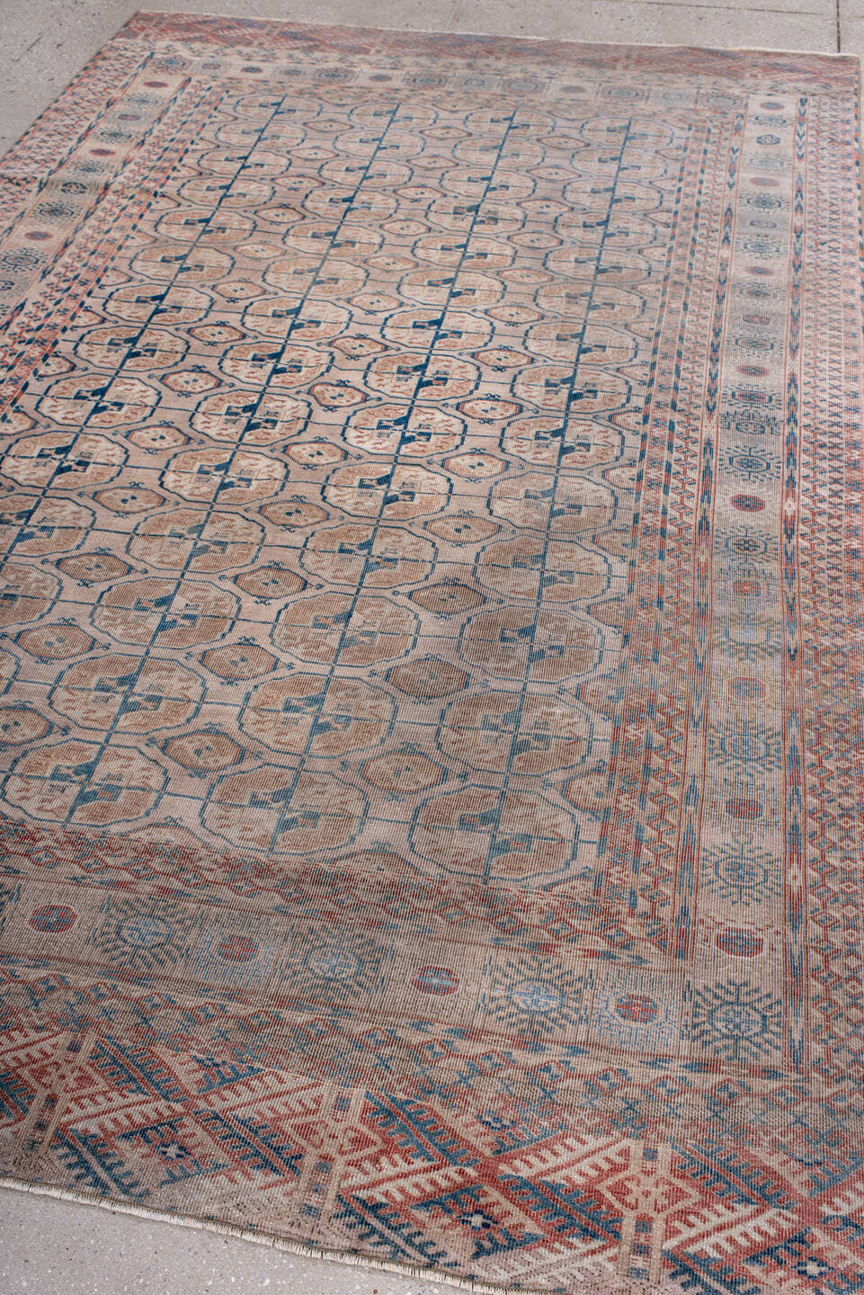 5' x 9' one-of-a-kind handmade antique Bokara medium size rug. Color palette: ivory, taupe, rust, blue, camel, slate, beige