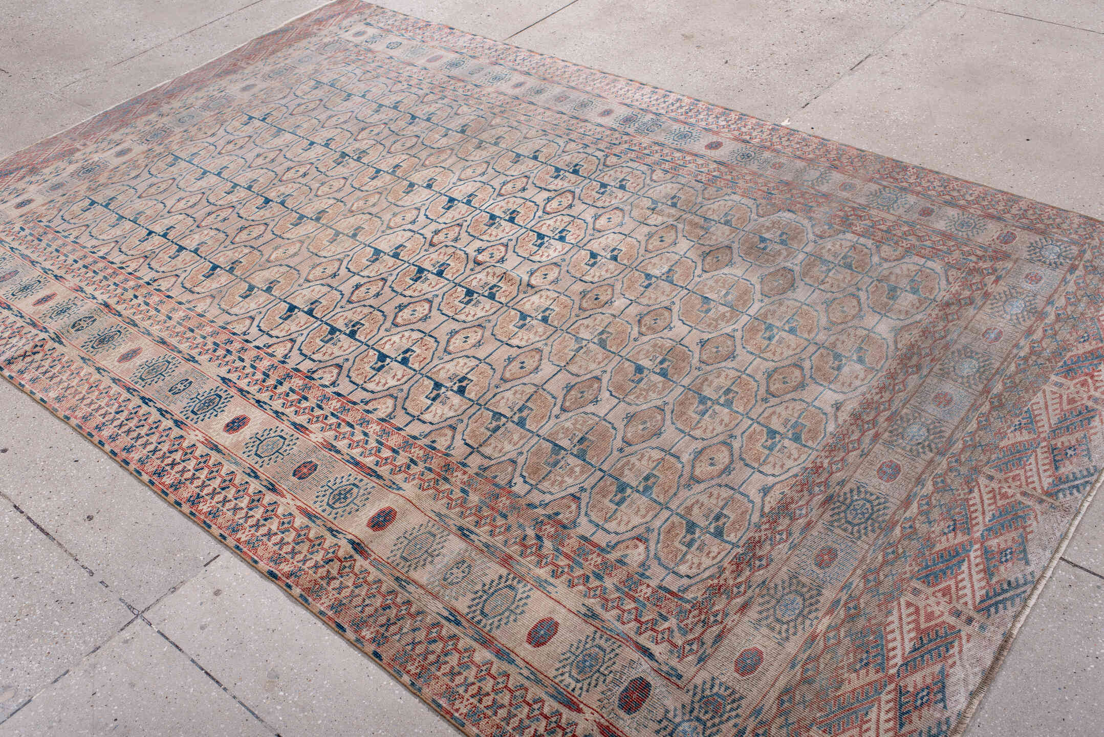 5' x 9' one-of-a-kind handmade antique Bokara medium size rug. Color palette: ivory, taupe, rust, blue, camel, slate, beige