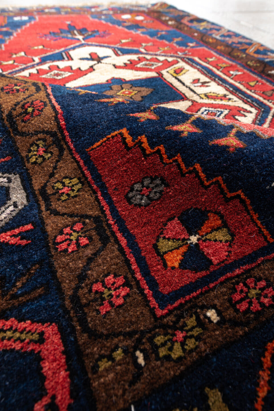 3' x 4' one-of-a-kind handmade antique Anatolian small size rug. Color palette: navy, rust, ivory, brown, crimson, gold