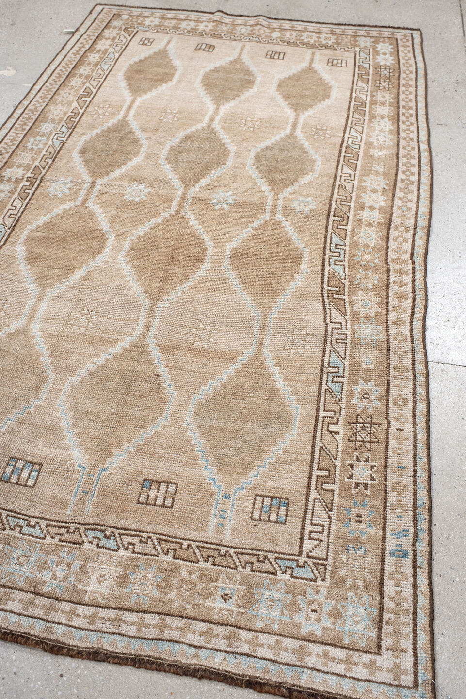 4' x 7' one-of-a-kind handmade antique Gabbe rug. Color palette: beige, taupe, ivory, camel, light blue, brown, gray