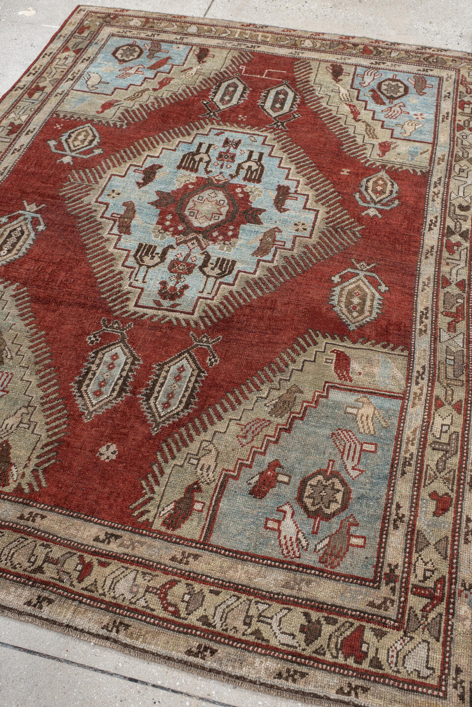 4' x 6' one-of-a-kind handmade vintage Kazak small size rug. Color palette: rust, ivory, sky blue, taupe, brown, charcoal