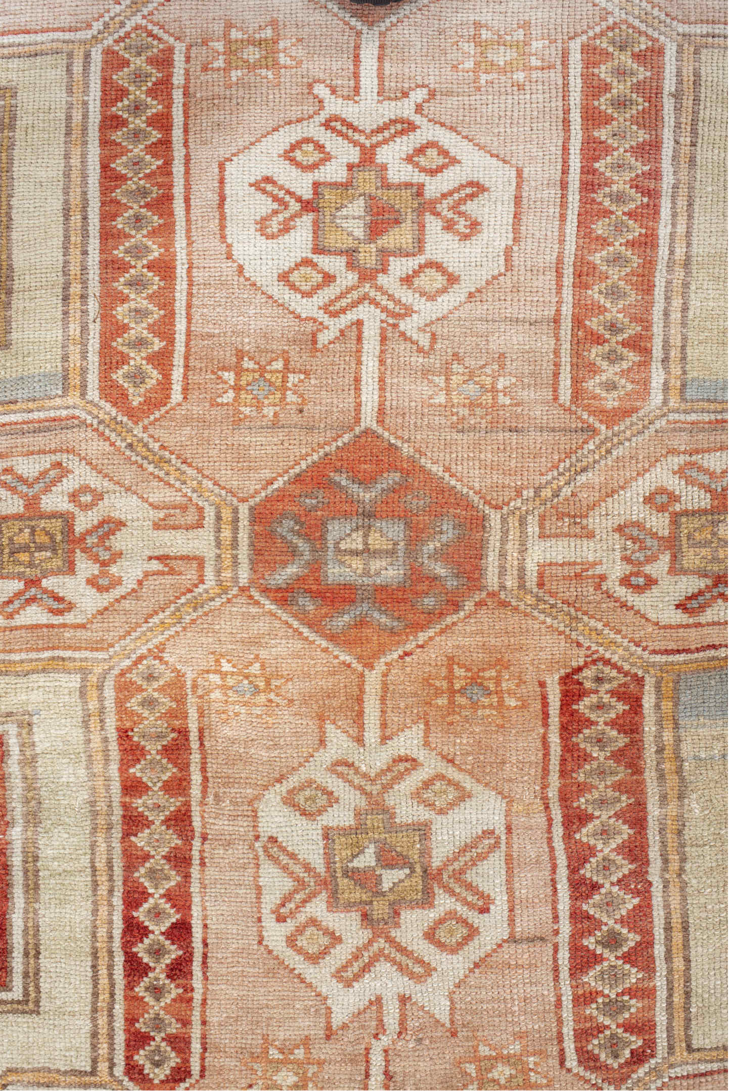 4' x 7' one-of-a-kind handmade vintage Anatolian rug. Color palette: brown, gray, light gray, off-white, orange, pink