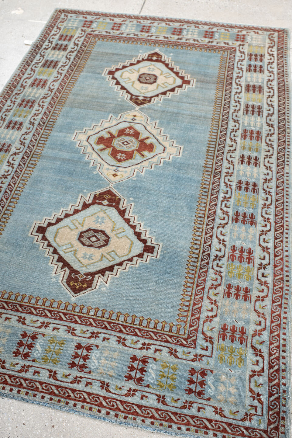 3' x 6' one-of-a-kind handmade antique Kuba small size rug. Color palette: light blue, ivory, rust, brown, gold, terracotta