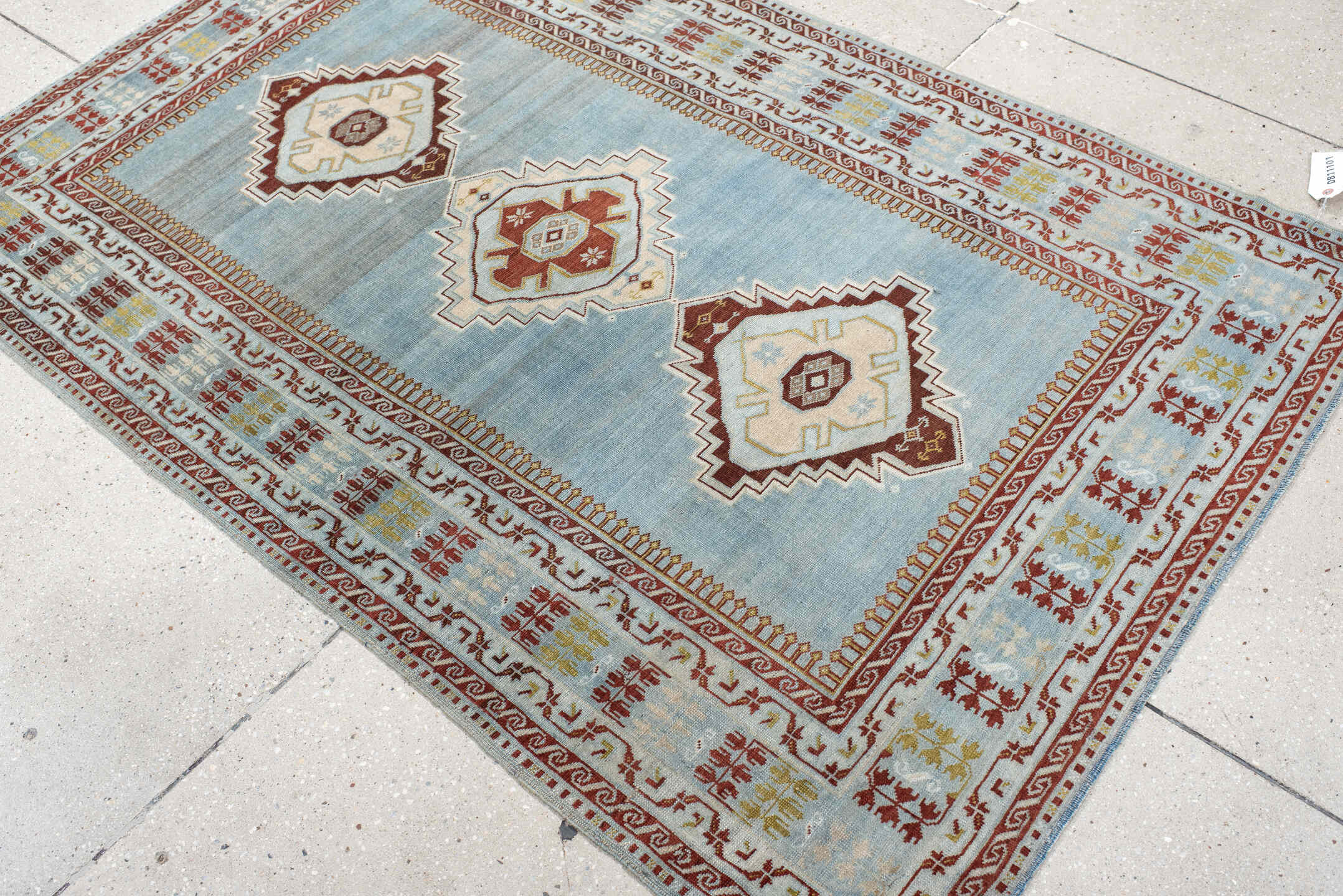 3' x 6' one-of-a-kind handmade antique Kuba small size rug. Color palette: light blue, ivory, rust, brown, gold, terracotta