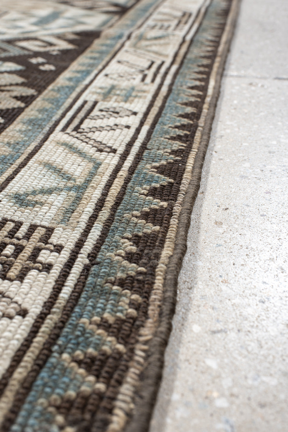 4' x 10' one-of-a-kind handmade antique Caucasian runner rug. Color palette: ivory, charcoal, taupe, brown, slate, gray
