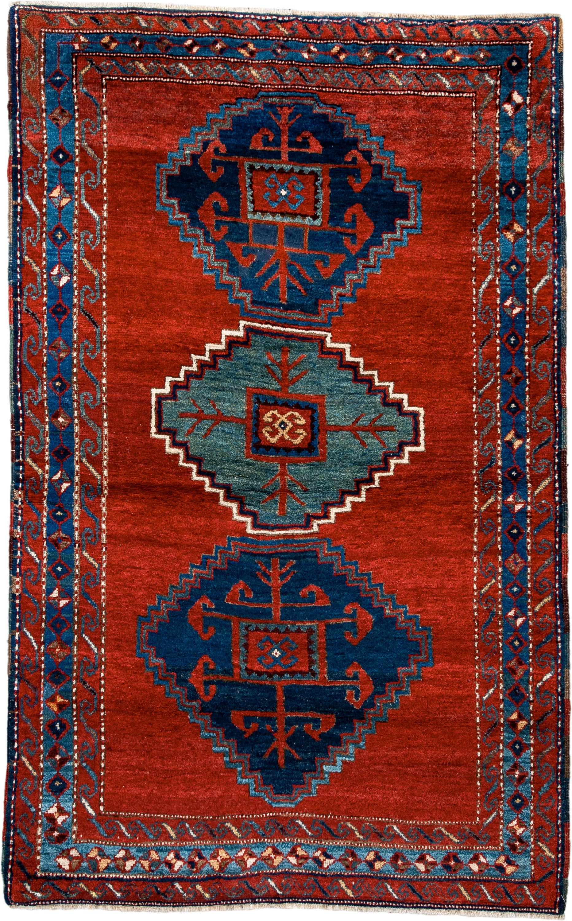 4' x 6' one-of-a-kind handmade antique Kazak small size rug. Color palette: rust, navy, sky_blue, ivory, brick, teal