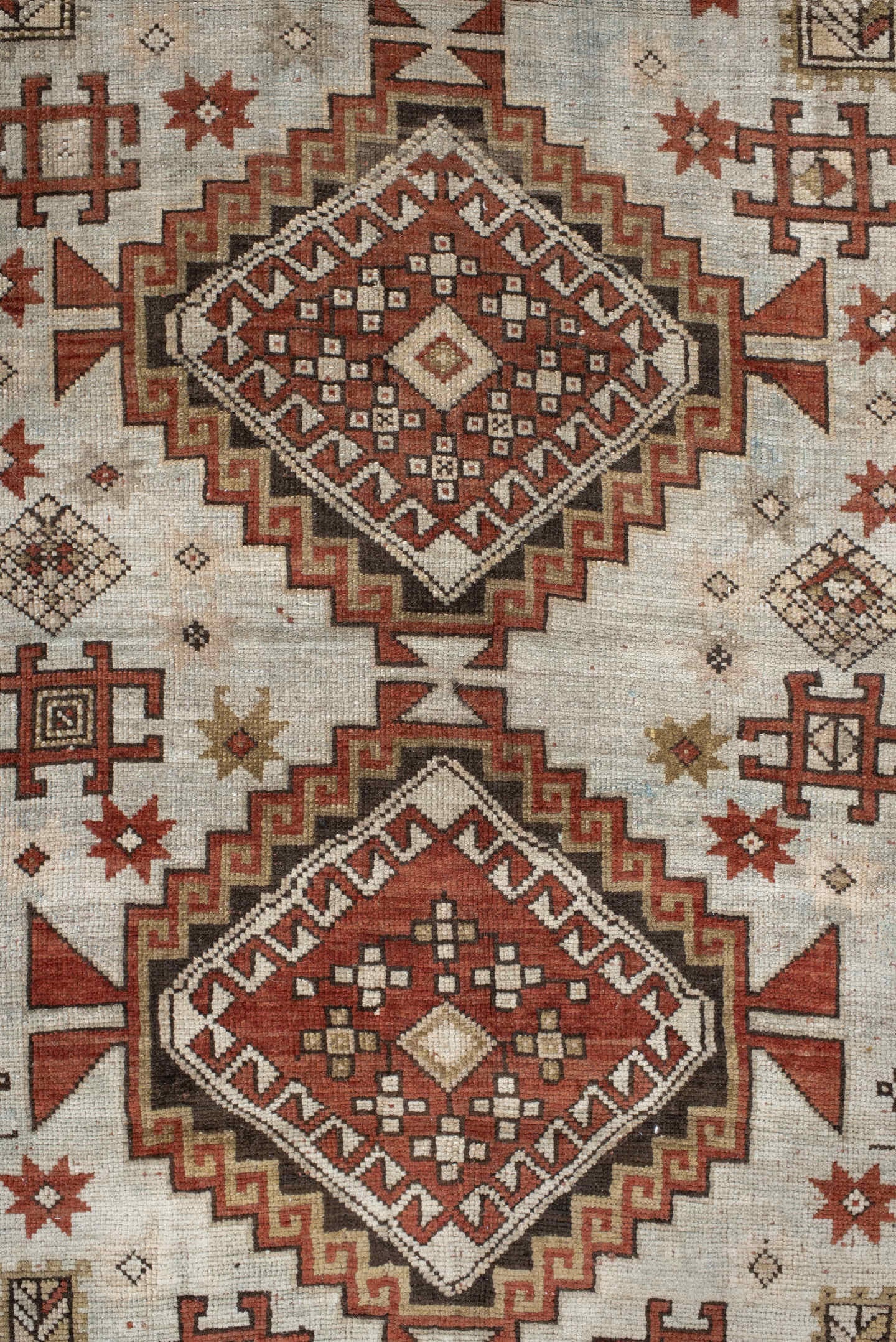 4' x 8' one-of-a-kind handmade vintage Caucasian medium size rug. Color palette: ivory, rust, taupe, brown, charcoal, beige