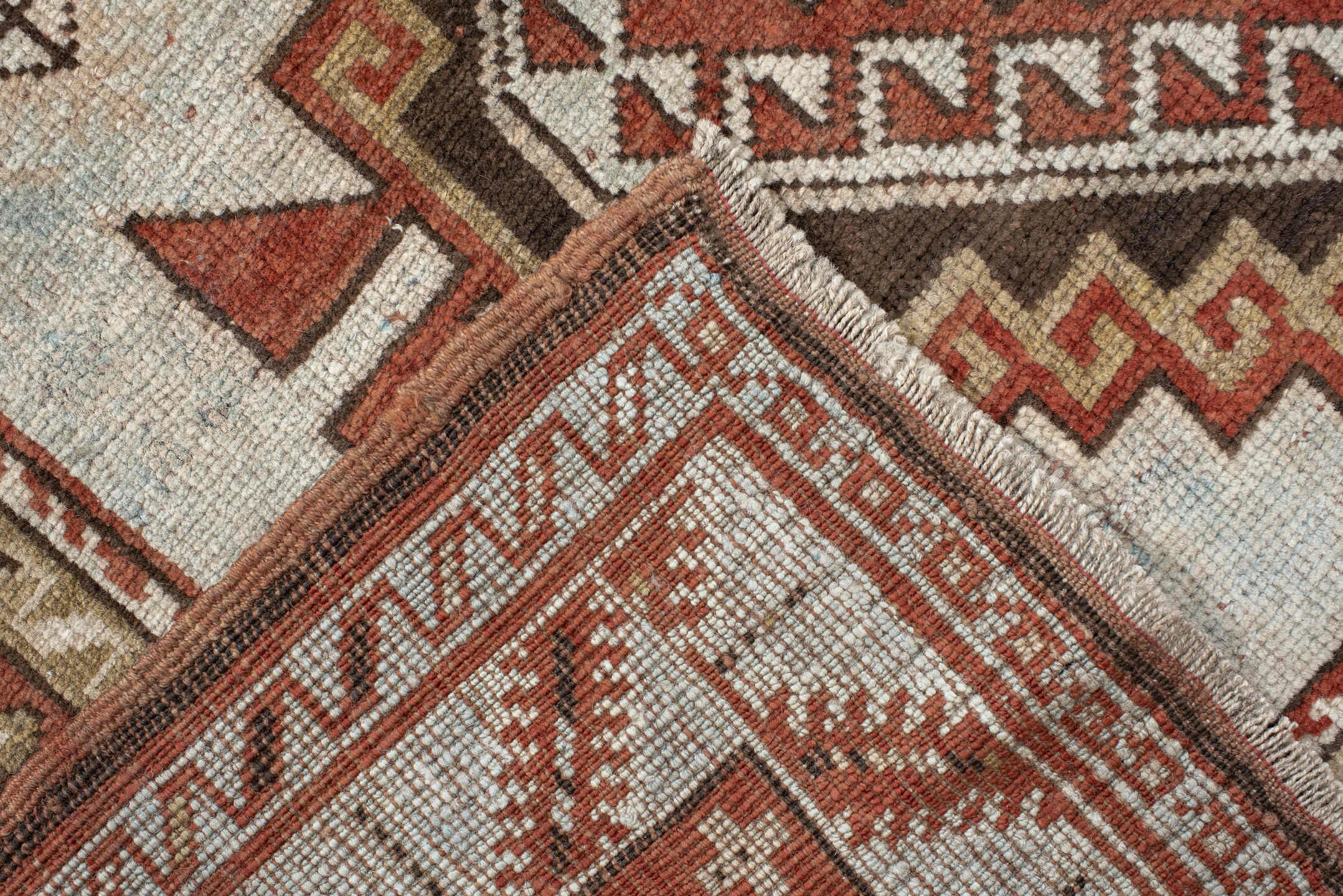 4' x 8' one-of-a-kind handmade vintage Caucasian medium size rug. Color palette: ivory, rust, taupe, brown, charcoal, beige