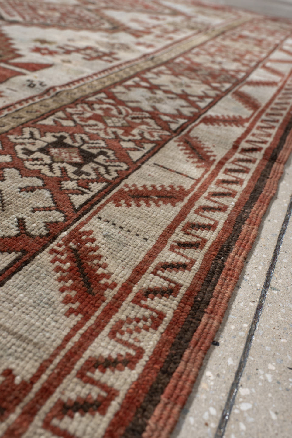 4' x 8' one-of-a-kind handmade vintage Caucasian medium size rug. Color palette: ivory, rust, taupe, brown, charcoal, beige