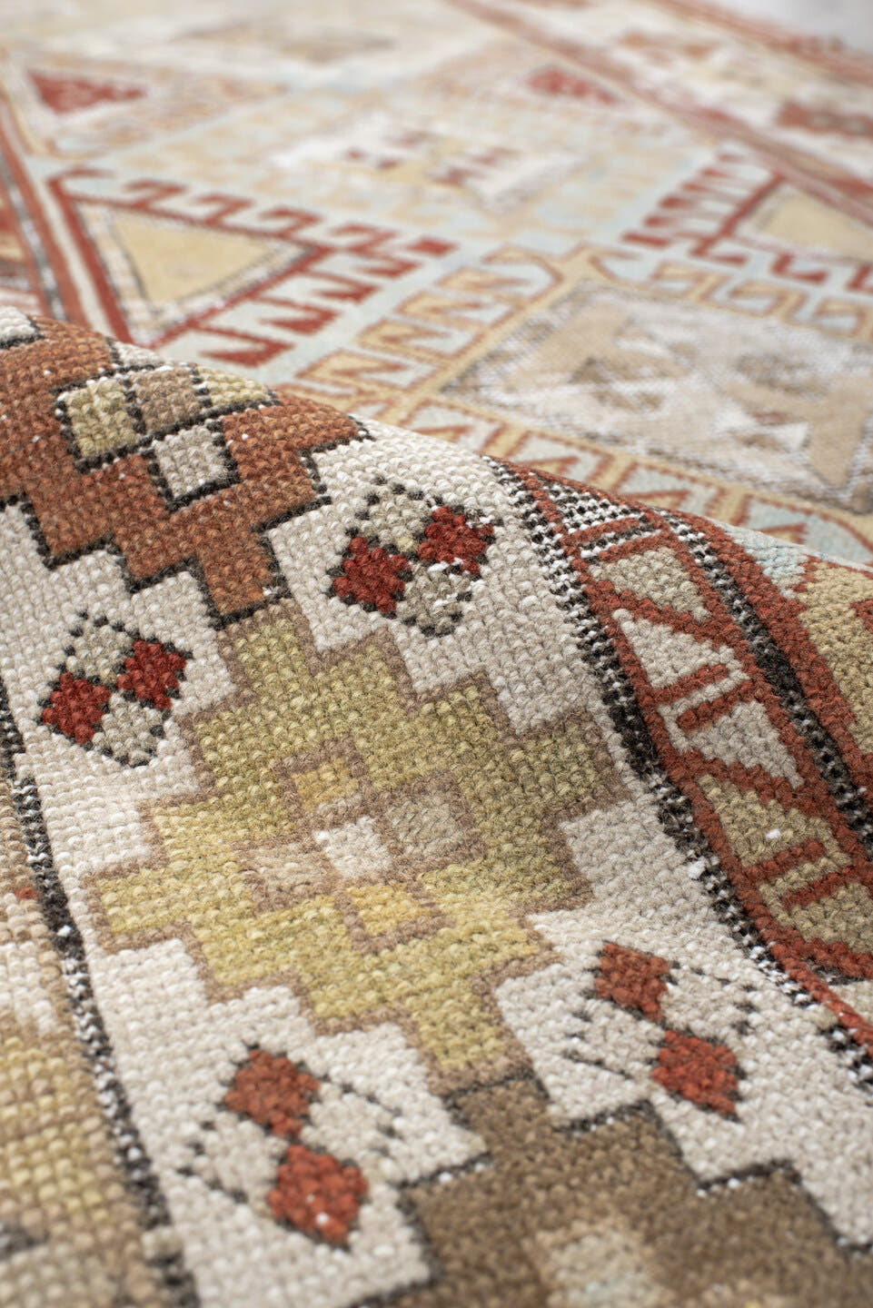 3' x 8' one-of-a-kind handmade antique Caucasian runner rug. Color palette: ivory, sky blue, rust, burgundy, camel, taupe