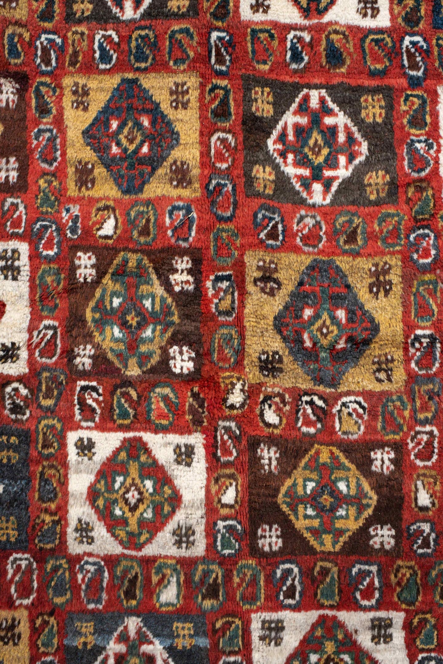 5' x 7' one-of-a-kind handmade vintage Gabbe rug. Color palette: rust, ivory, navy, camel, brown, teal, gold, charcoal