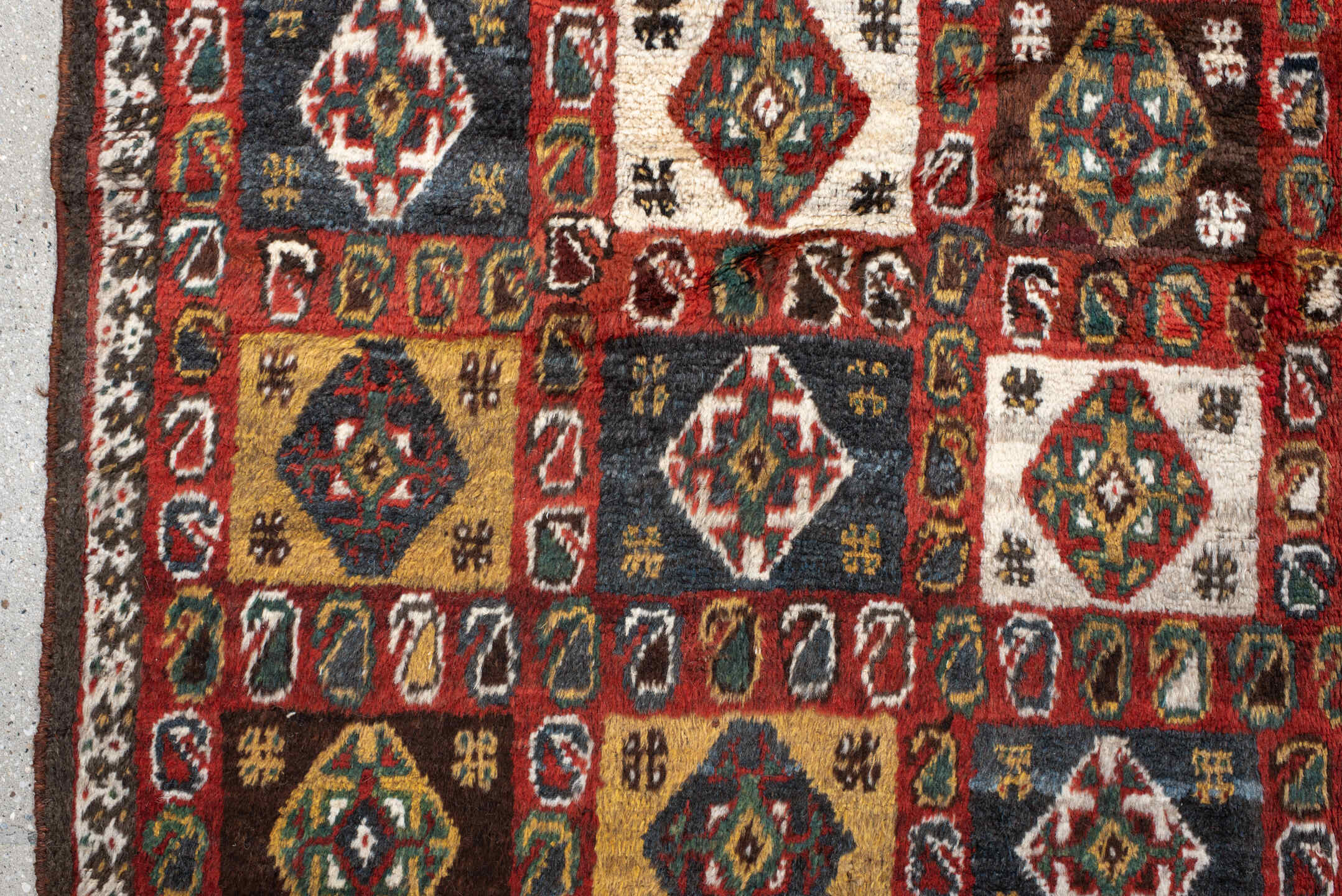 5' x 7' one-of-a-kind handmade vintage Gabbe rug. Color palette: rust, ivory, navy, camel, brown, teal, gold, charcoal