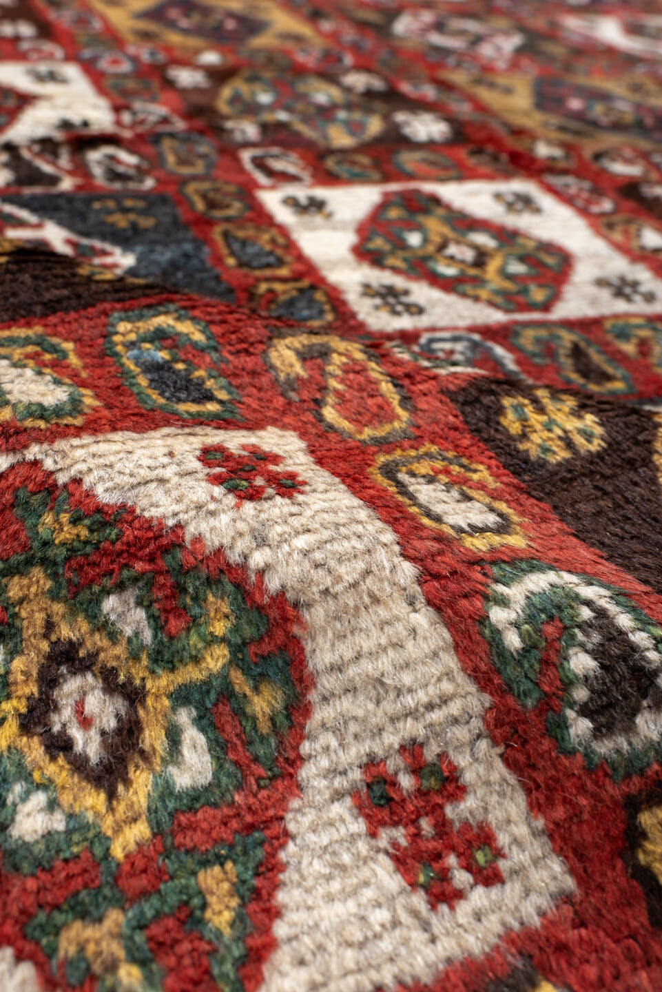 5' x 7' one-of-a-kind handmade vintage Gabbe rug. Color palette: rust, ivory, navy, camel, brown, teal, gold, charcoal