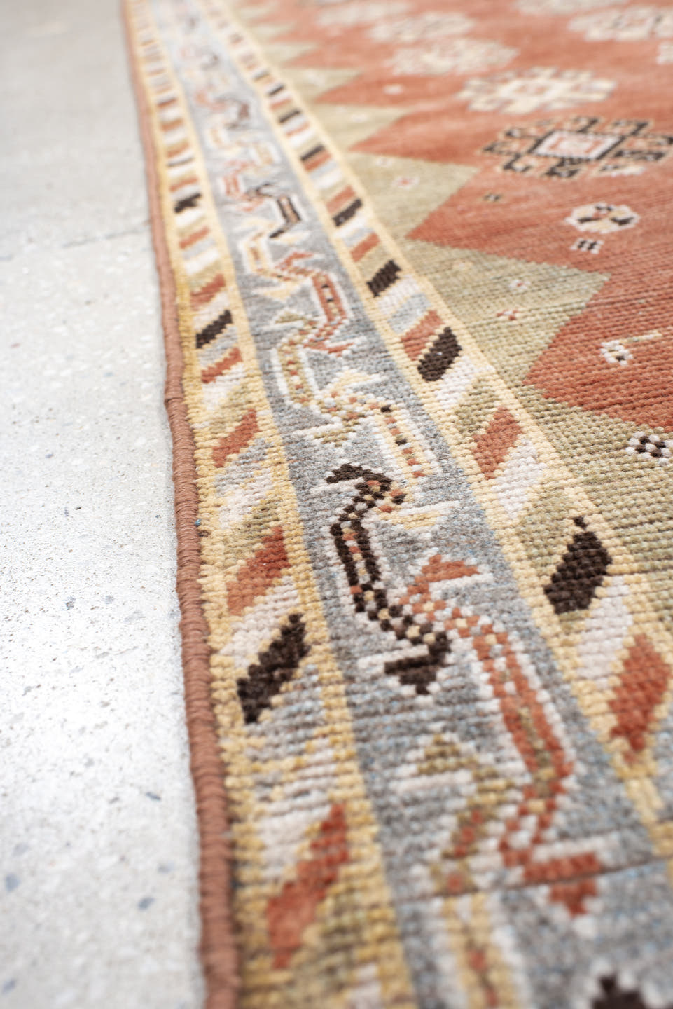 3' x 7' one-of-a-kind handmade vintage Gabbe rug. Color palette: terra cotta, ivory, sage, pale blue, charcoal, taupe, rust