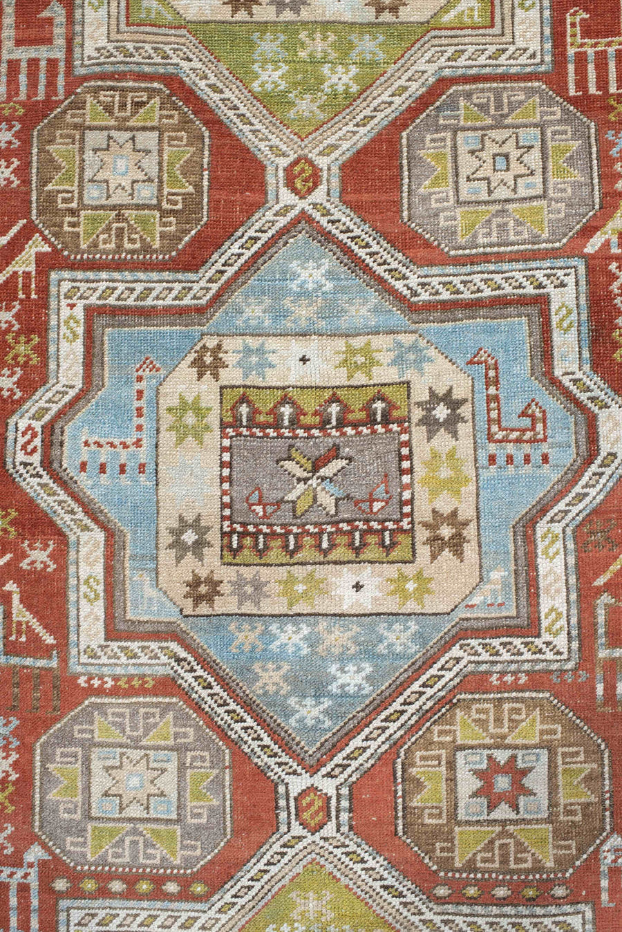 3' x 6' one-of-a-kind handmade vintage Caucasian small size rug. Color palette: rust, ivory, sage, sky blue, taupe, brown