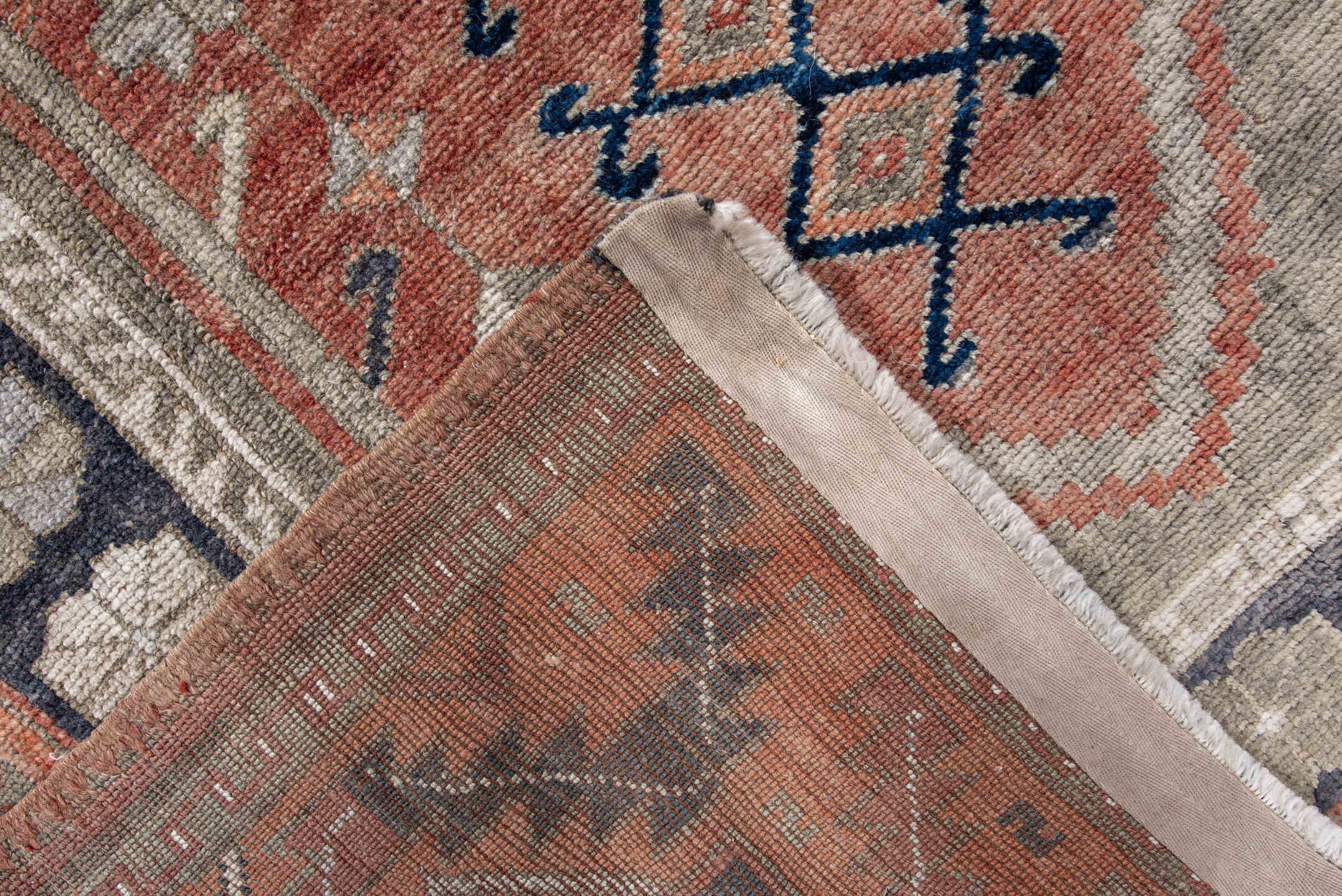 4' x 6' one-of-a-kind handmade antique Anatolian rug. Color palette: coral, gray, navy, ivory, rust, taupe, terracotta, blue