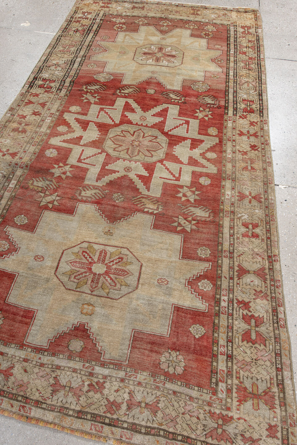 4' x 8' one-of-a-kind handmade vintage Anatol rug. Color palette: brown, gray, light gray, off-white, orange, pink, red