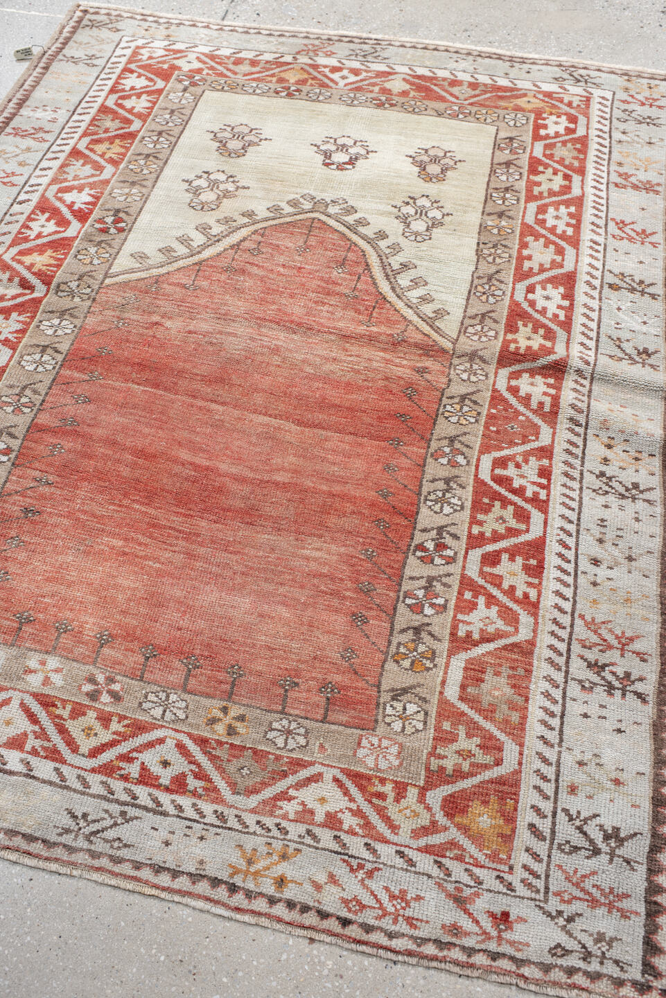 4' x 5' one-of-a-kind handmade antique Anatolian small size rug. Color palette: ivory, terra cotta, rust, taupe, brown