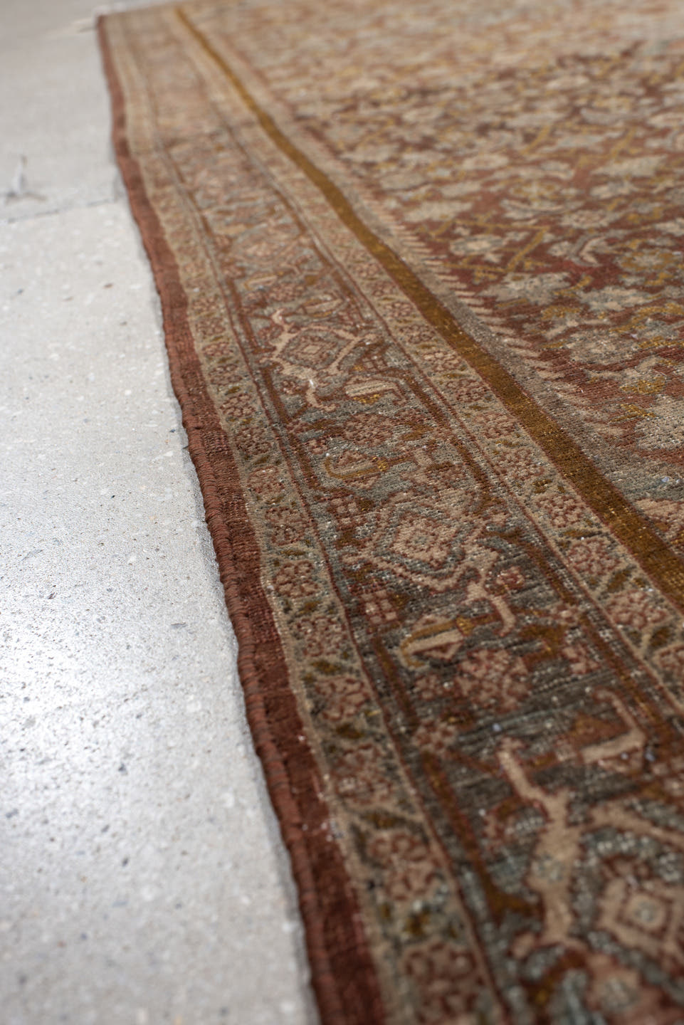 4' x 7' one-of-a-kind handmade vintage Bidjar rug. Color palette: rust, ivory, pale blue, taupe, rose, gold, brown