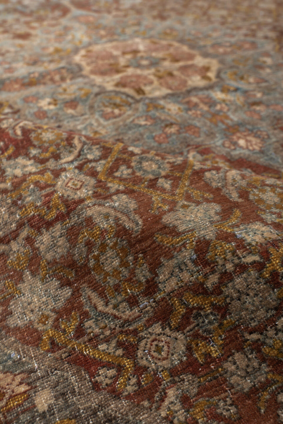 4' x 7' one-of-a-kind handmade vintage Bidjar rug. Color palette: rust, ivory, pale blue, taupe, rose, gold, brown