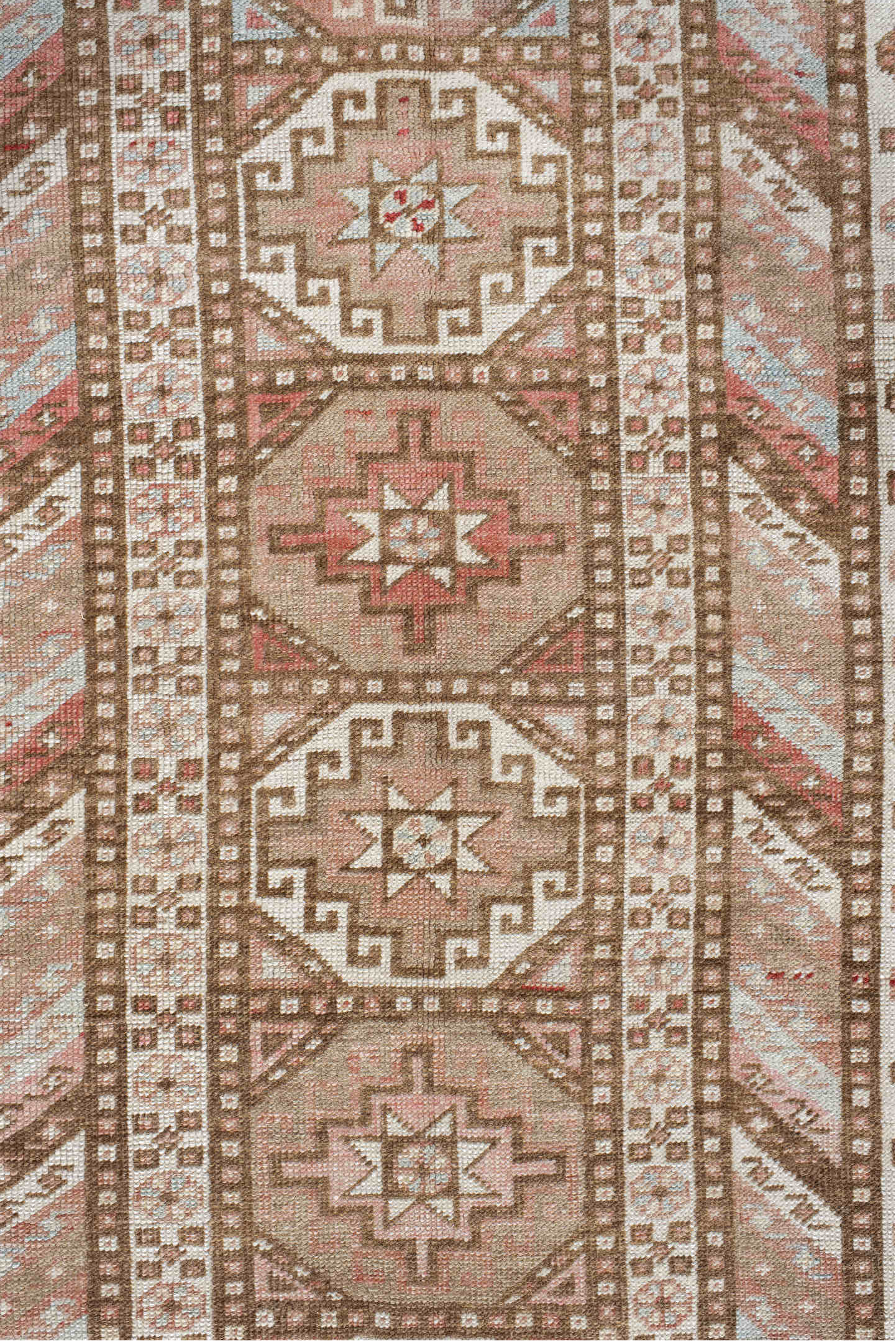 4' x 10' one-of-a-kind handmade vintage Caucasian runner rug. Color palette: brown, gray, light gray, misty rose, off-white