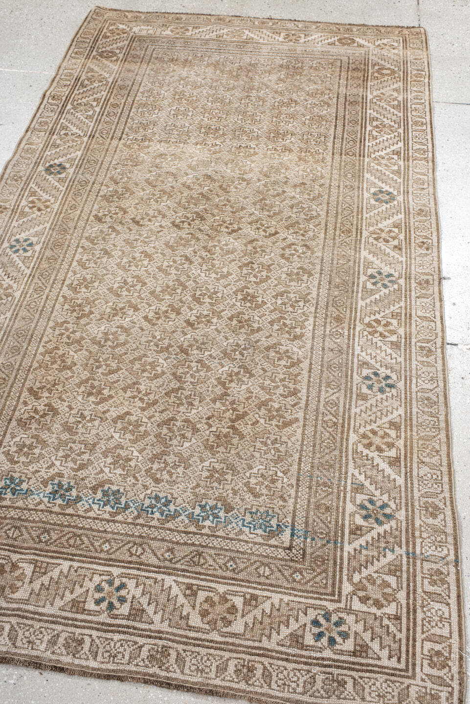 3' x 7' one-of-a-kind handmade vintage Belouch rug. Color palette: ivory, taupe, beige, camel, sky_blue, gray, light blue