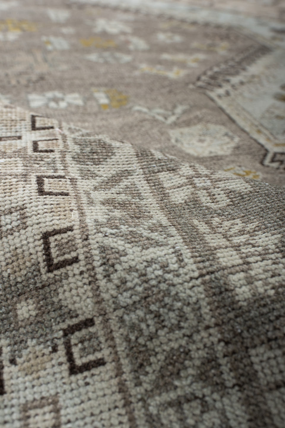 6' x 10' one-of-a-kind handmade antique Qashqai large size rug. Color palette: taupe, ivory, camel, rose, gold, brown, cream