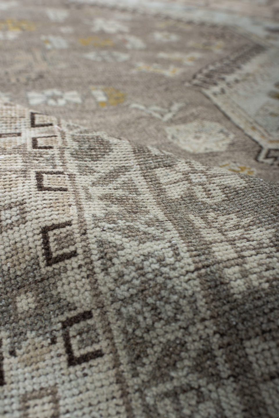6' x 10' one-of-a-kind handmade antique Qashqai large size rug. Color palette: taupe, ivory, camel, rose, gold, brown, cream