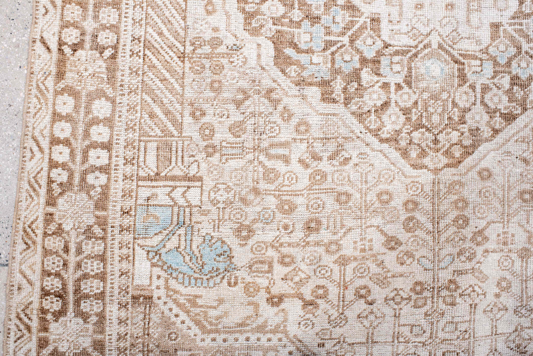 4' x 8' one-of-a-kind handmade antique Shiraz rug. Color palette: ivory, taupe, camel, pale blue, beige, light brown, gray