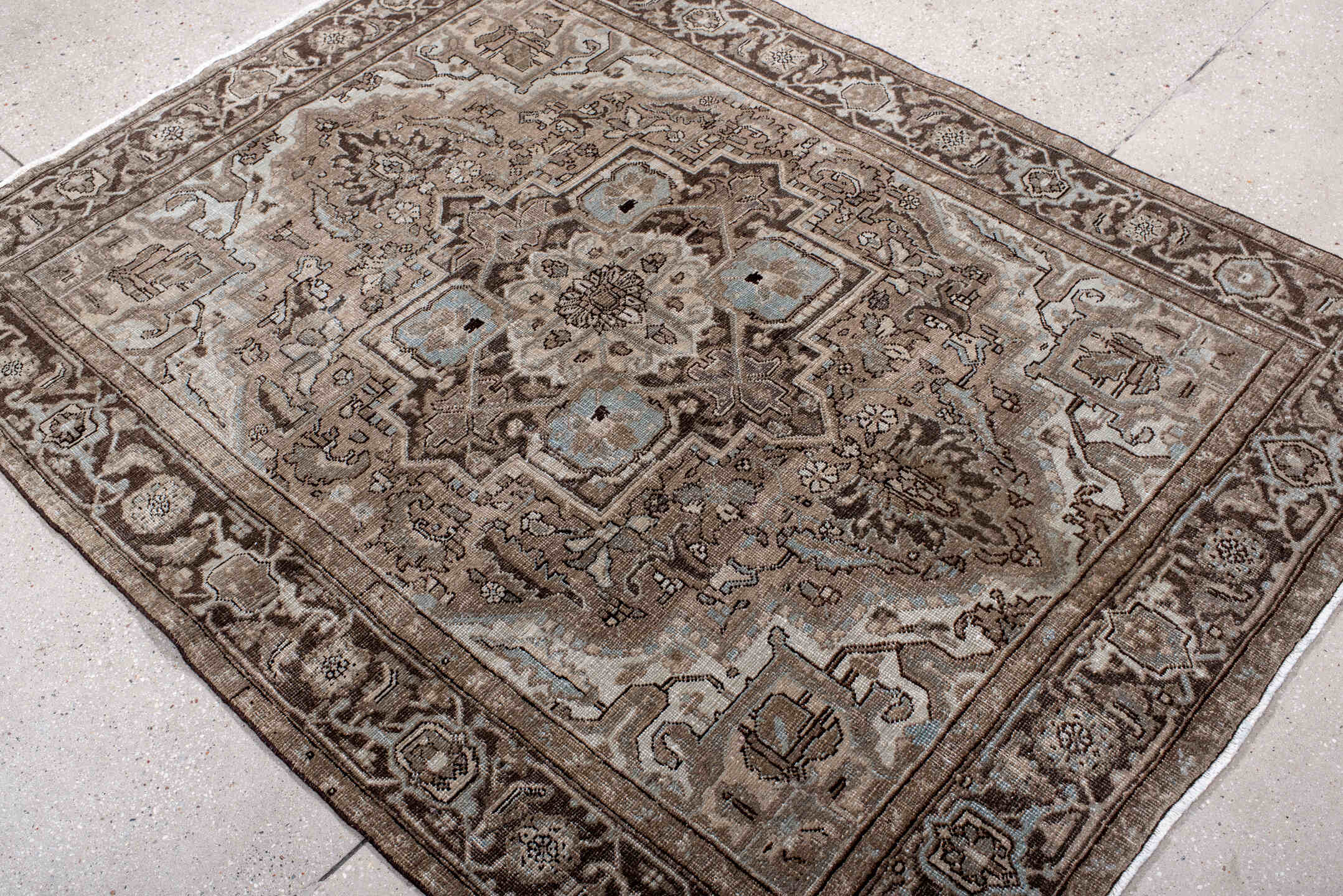 4' x 6' one-of-a-kind handmade vintage Heriz small size rug. Color palette: black, brown, gray, light gray, off-white, pink