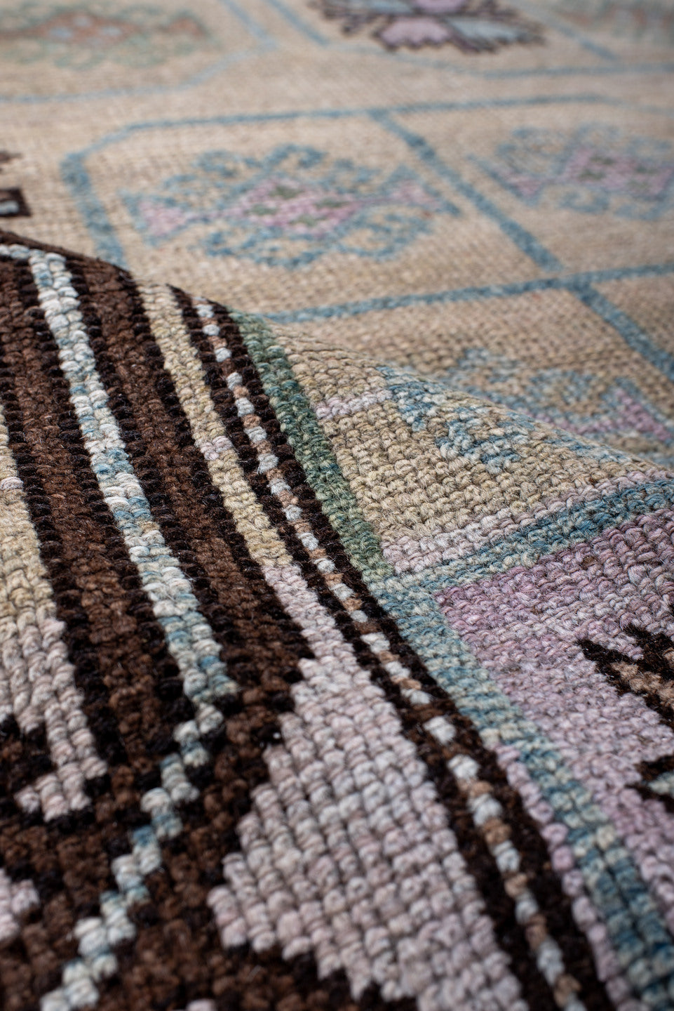 3' x 6' one-of-a-kind handmade antique Belouch small size rug. Color palette: ivory, lilac, brown, aqua, sage, taupe, pink