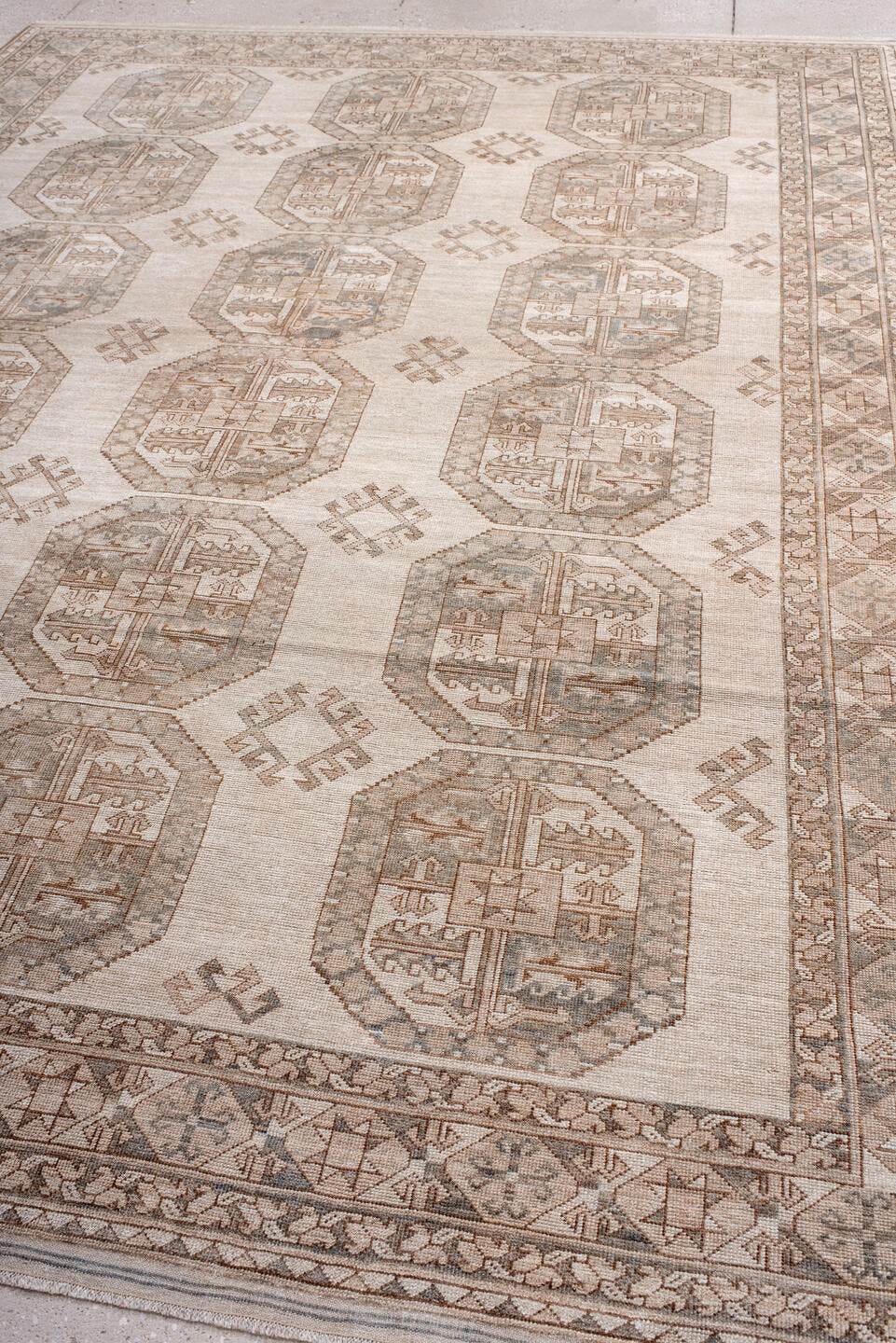 7' x 10' one-of-a-kind handmade antique Afghan large size rug. Color palette: ivory, taupe, sand, sage, camel, pewter, beige