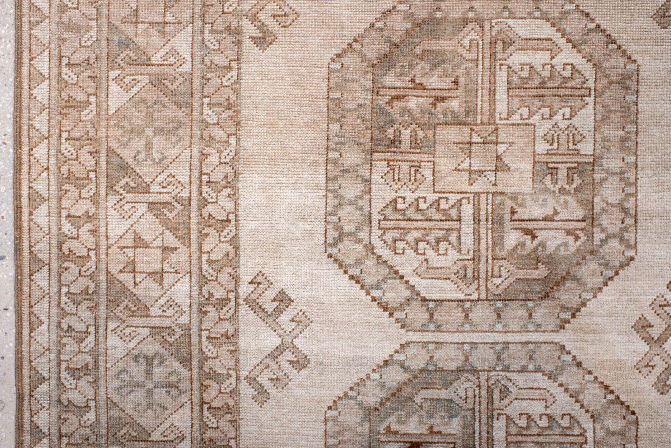 7' x 10' one-of-a-kind handmade antique Afghan large size rug. Color palette: ivory, taupe, sand, sage, camel, pewter, beige