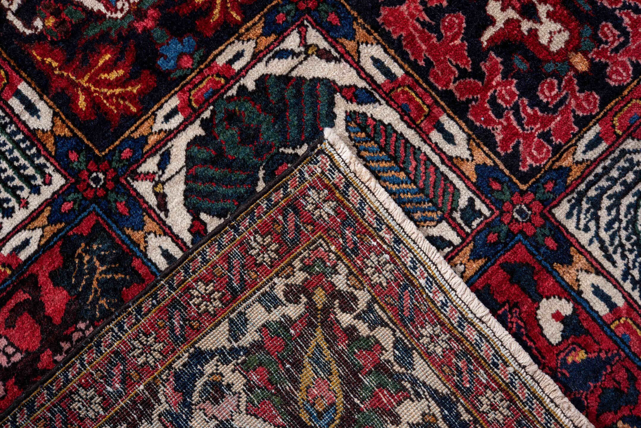 5' x 8' one-of-a-kind handmade antique Baktiary medium size rug. Color palette: red, navy, ivory, burgundy, cobalt, camel