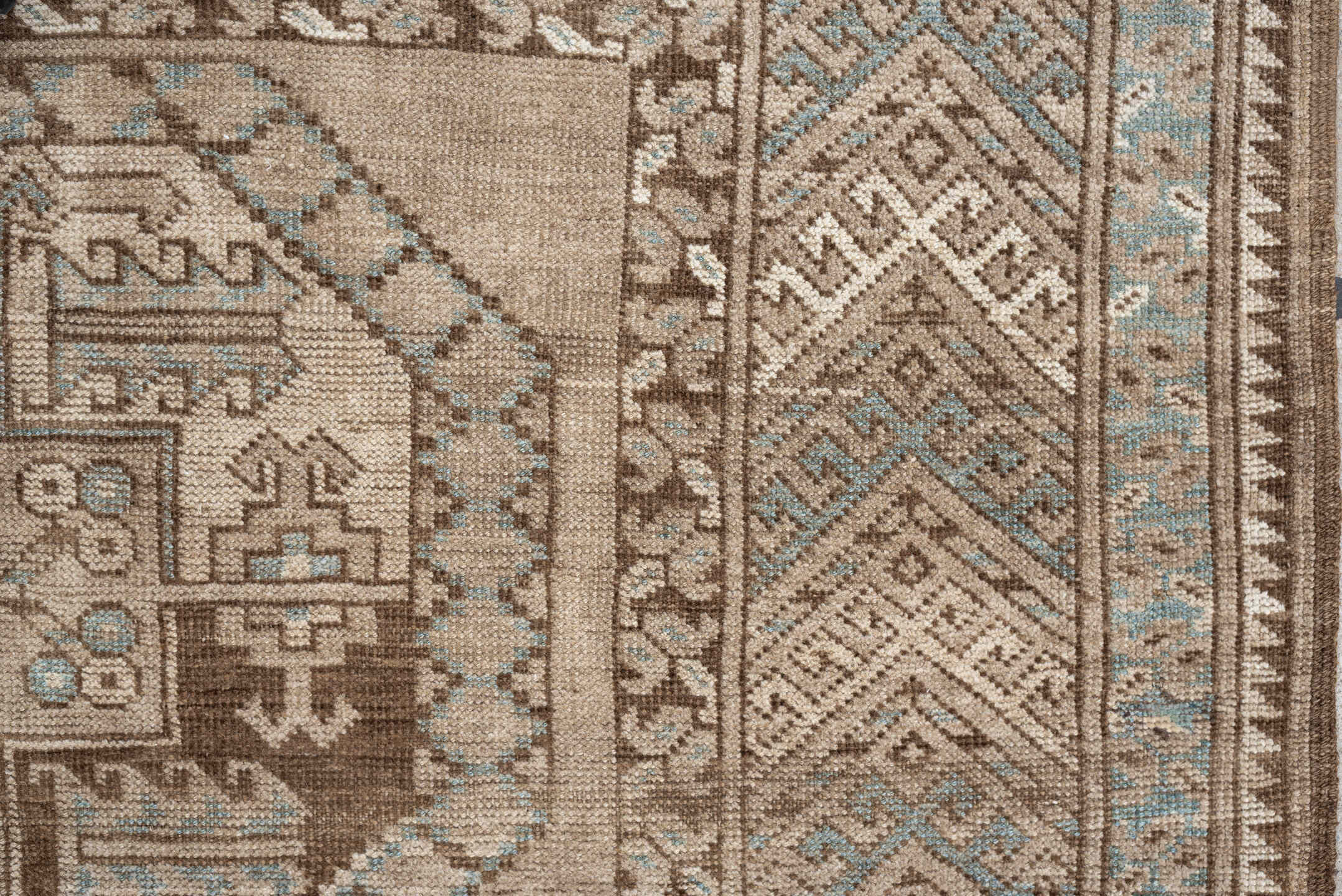 7' x 4' one-of-a-kind handmade vintage Afghan rug. Color palette: ivory, camel, taupe, light blue, brown, beige, gray