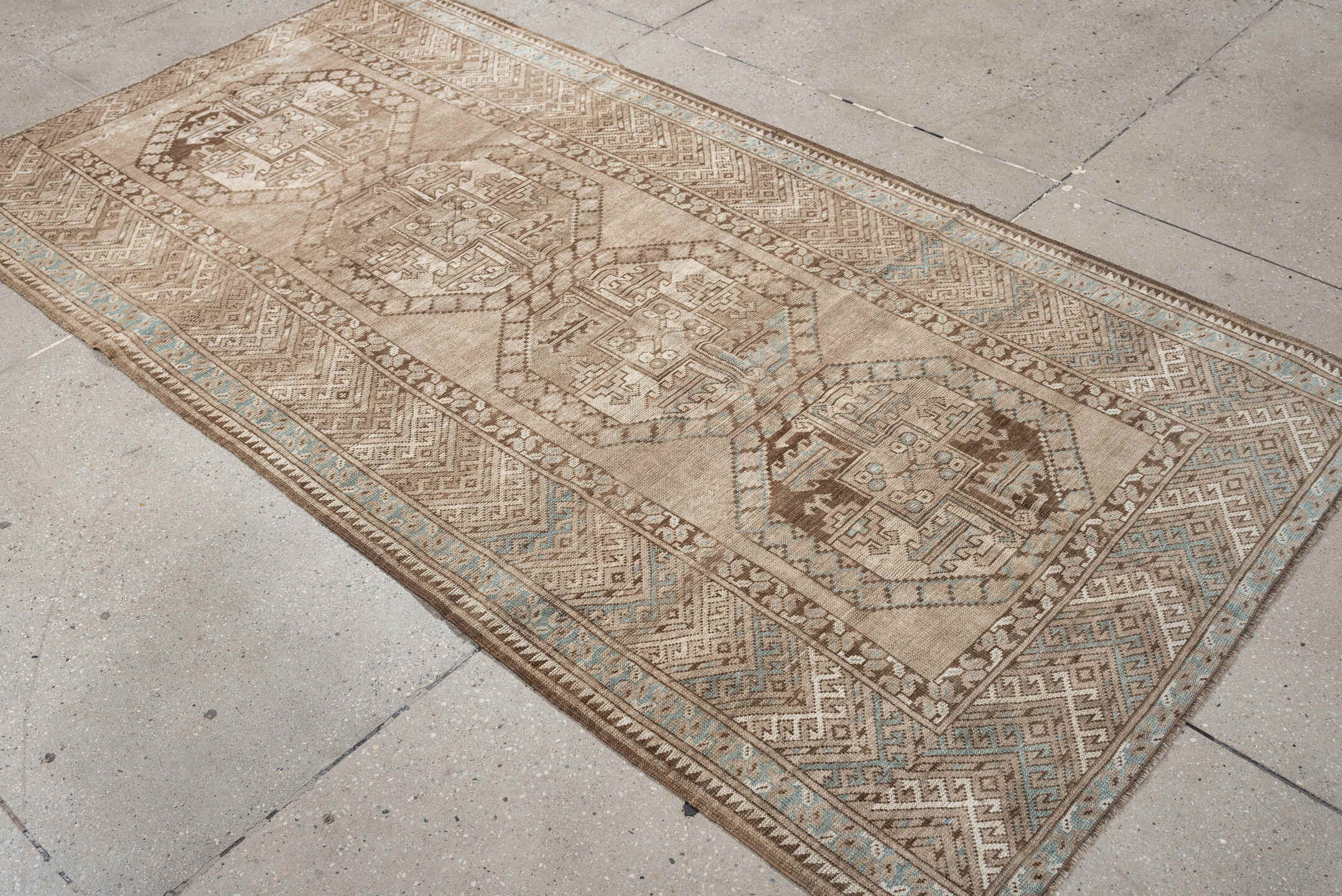 7' x 4' one-of-a-kind handmade vintage Afghan rug. Color palette: ivory, camel, taupe, light blue, brown, beige, gray