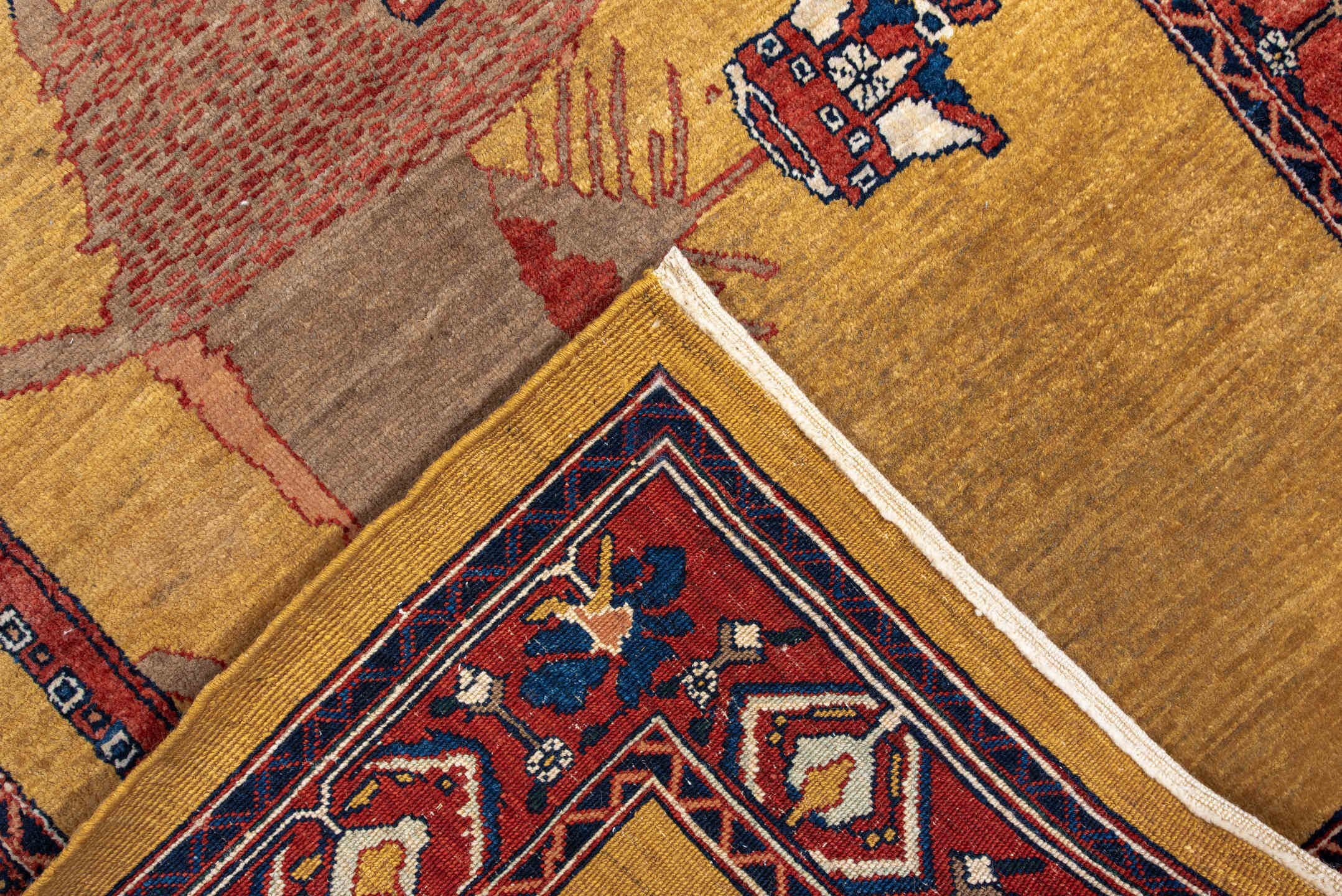 3' x 5' one-of-a-kind handmade vintage small size rug. Color palette: camel, rust, navy, ivory, taupe, rose, sienna, beige