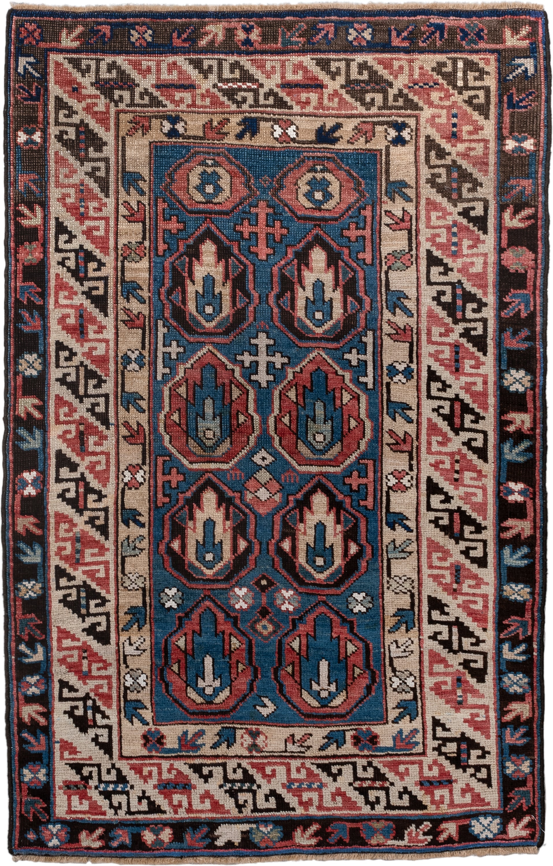 2' x 4' one-of-a-kind handmade vintage Caucasian small size rug. Color palette: blue, ivory, rust, brown, navy, pink, black