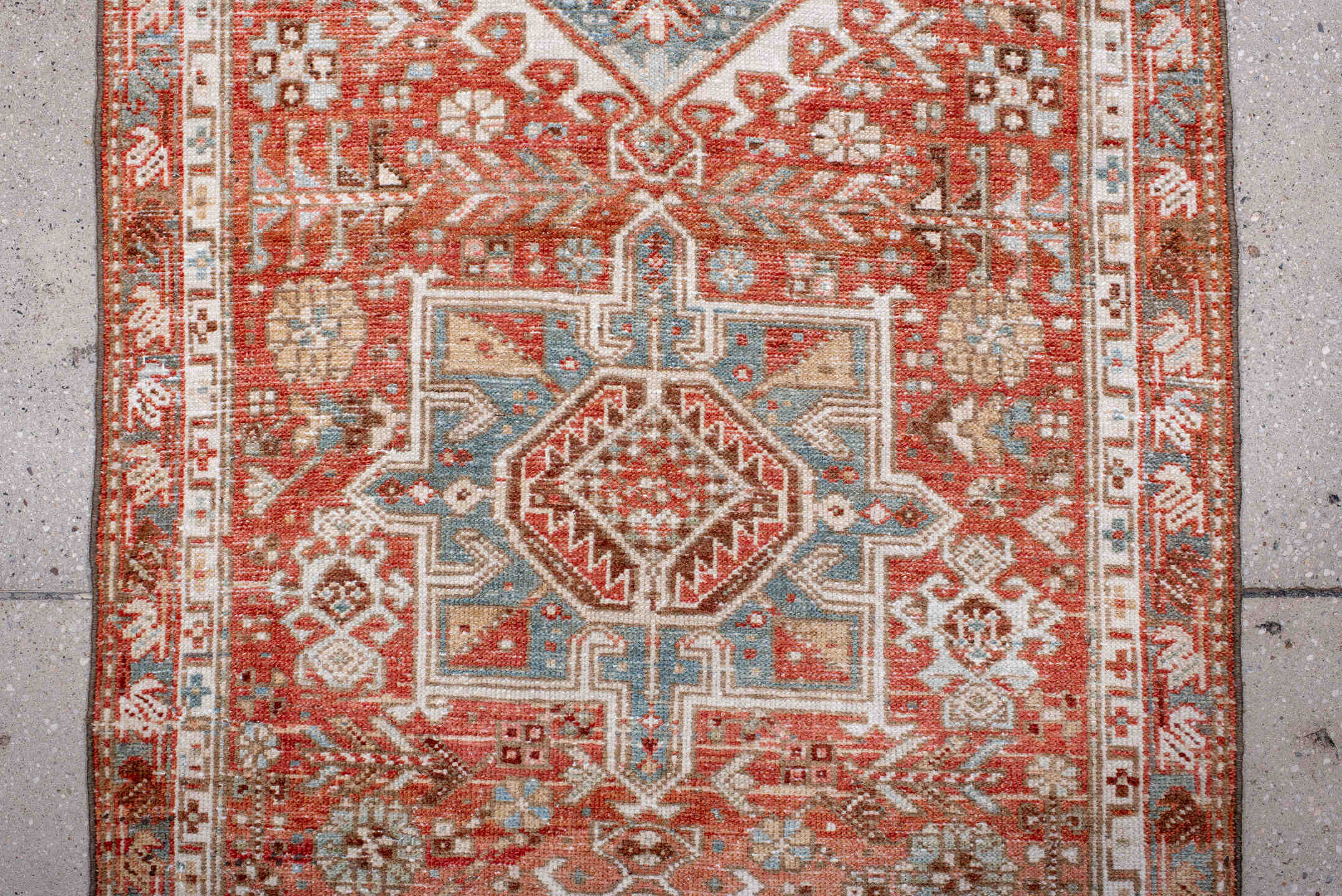 2' x 10' one-of-a-kind handmade antique Karaje runner rug. Color palette: rust, ivory, sky_blue, terra_cotta, camel, slate