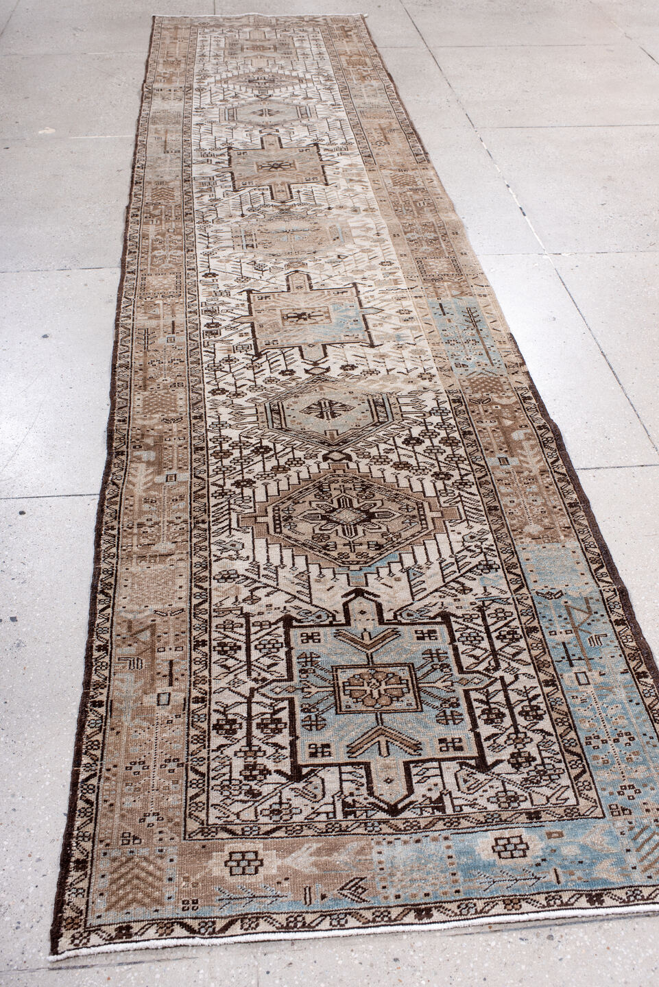 3' x 14' one-of-a-kind handmade antique Heriz runner rug. Color palette: ivory, taupe, camel, brown, sky_blue, beige, gray