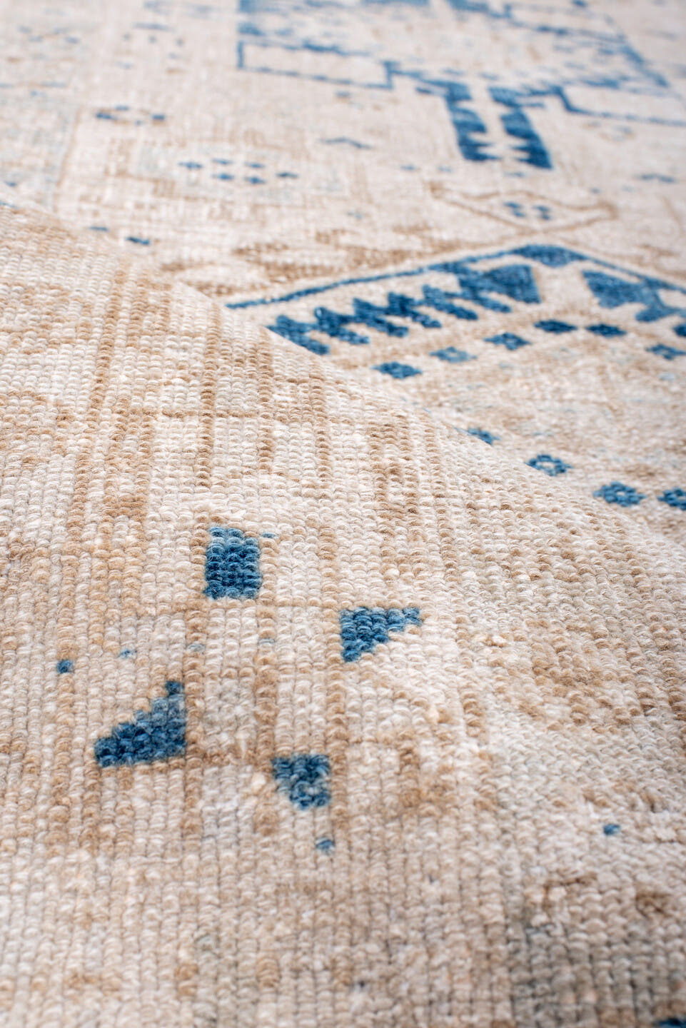 3' x 10' one-of-a-kind handmade antique Karaje runner rug. Color palette: ivory, sky blue, beige, camel, taupe, light blue