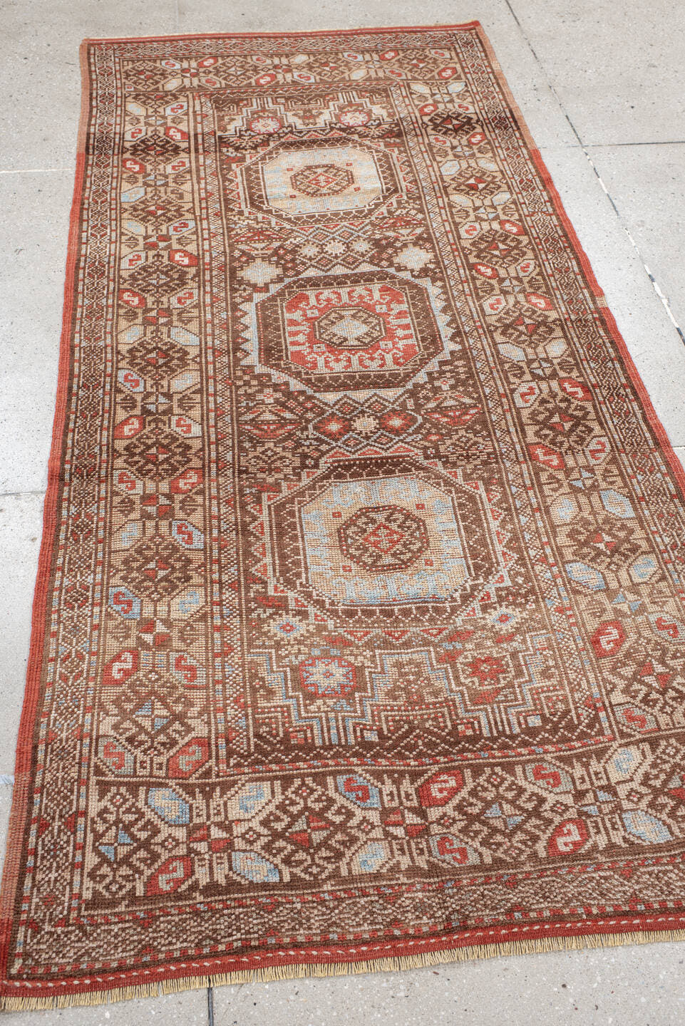 3' x 7' one-of-a-kind handmade antique Anatolian runner rug. Color palette: brown, ivory, rust, light blue, taupe