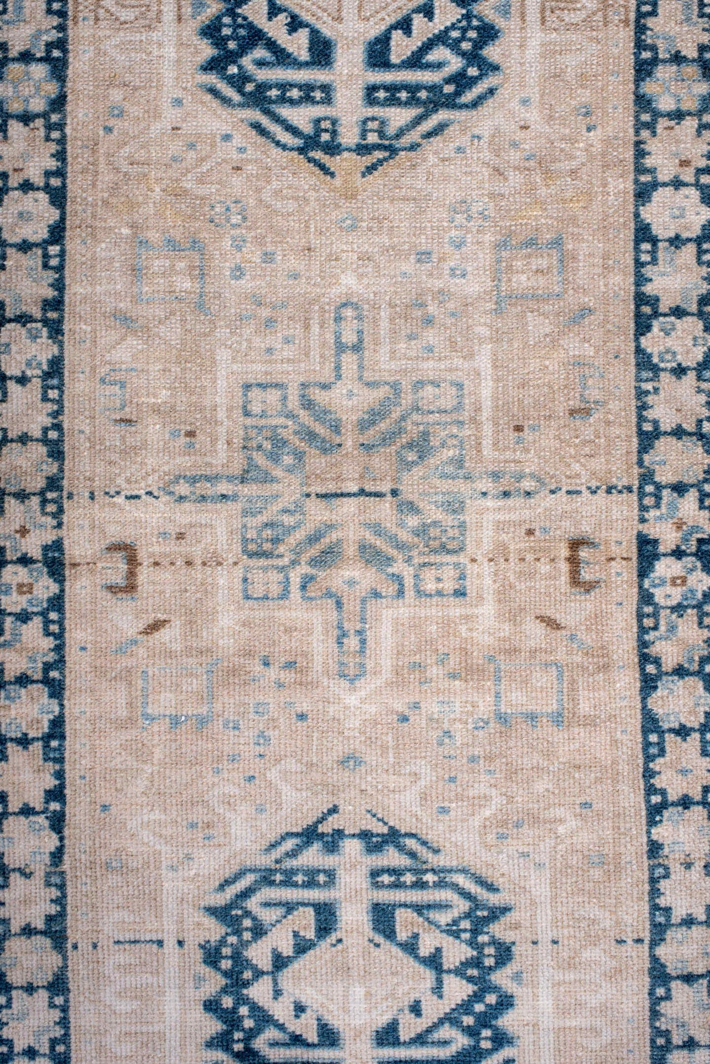 2' x 6' one-of-a-kind handmade antique Karaje runner rug. Color palette: ivory, sky blue, indigo, camel, taupe, brown