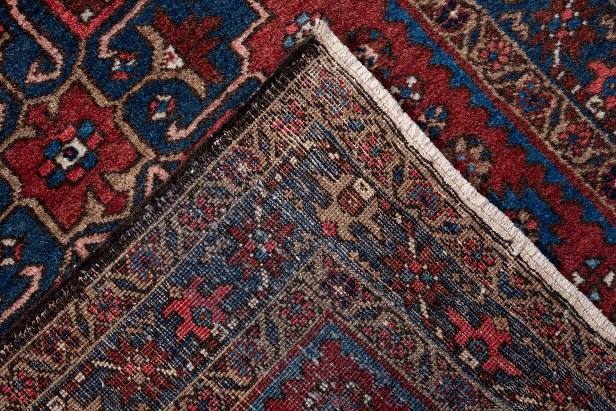 2' x 11' one-of-a-kind handmade vintage Heriz runner rug. Color palette: blue, brown, gray, pink, red