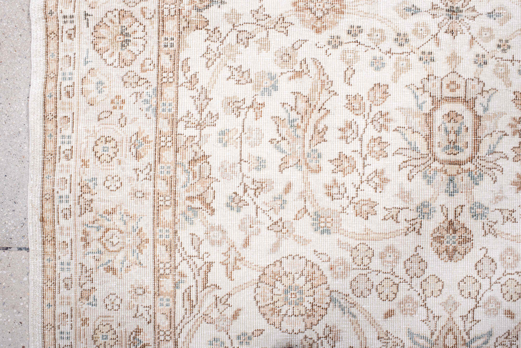 5' x 7' one-of-a-kind handmade antique Sparta rug. Color palette: ivory, beige, taupe, camel, pale blue, sand, gray