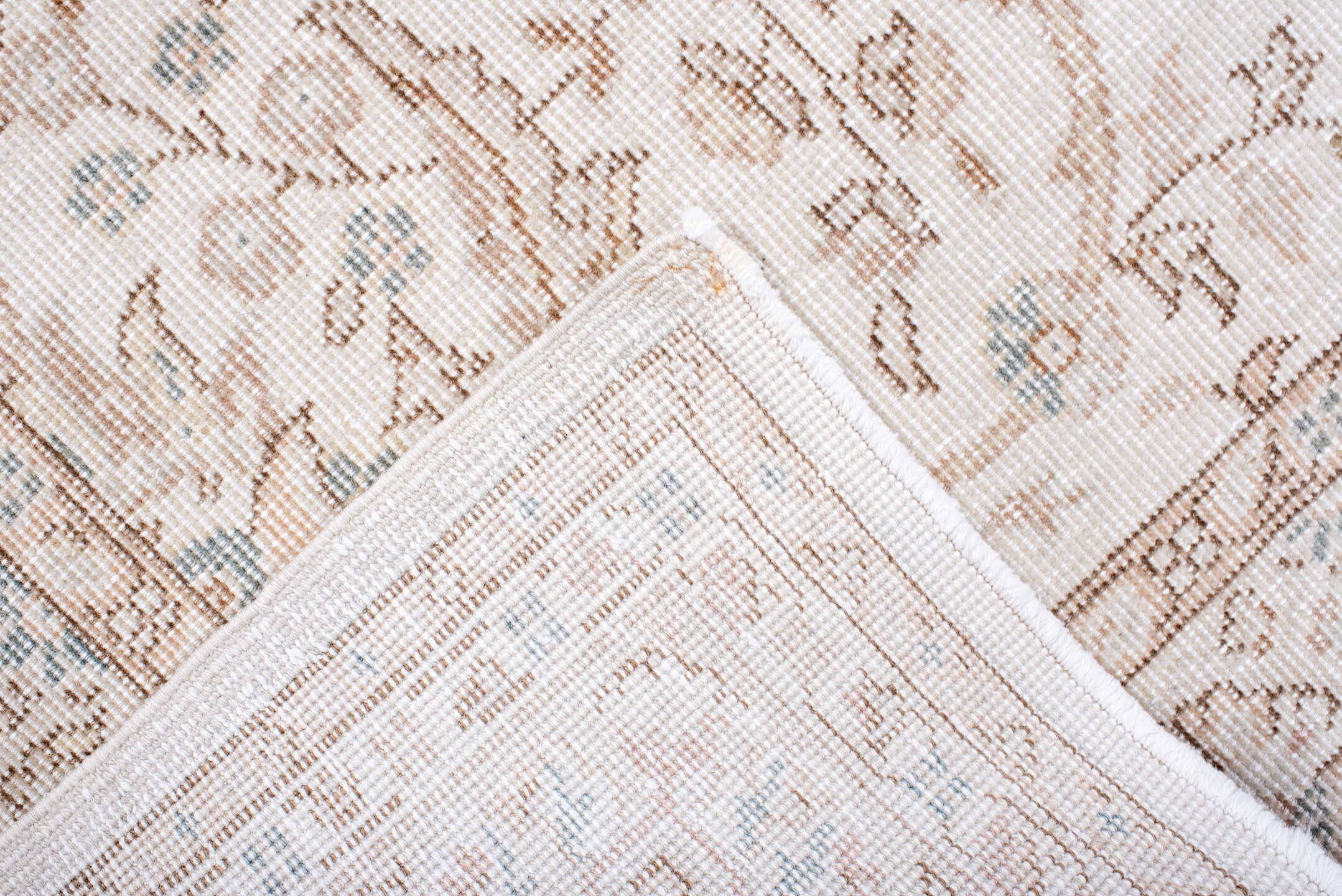 5' x 7' one-of-a-kind handmade antique Sparta rug. Color palette: ivory, beige, taupe, camel, pale blue, sand, gray