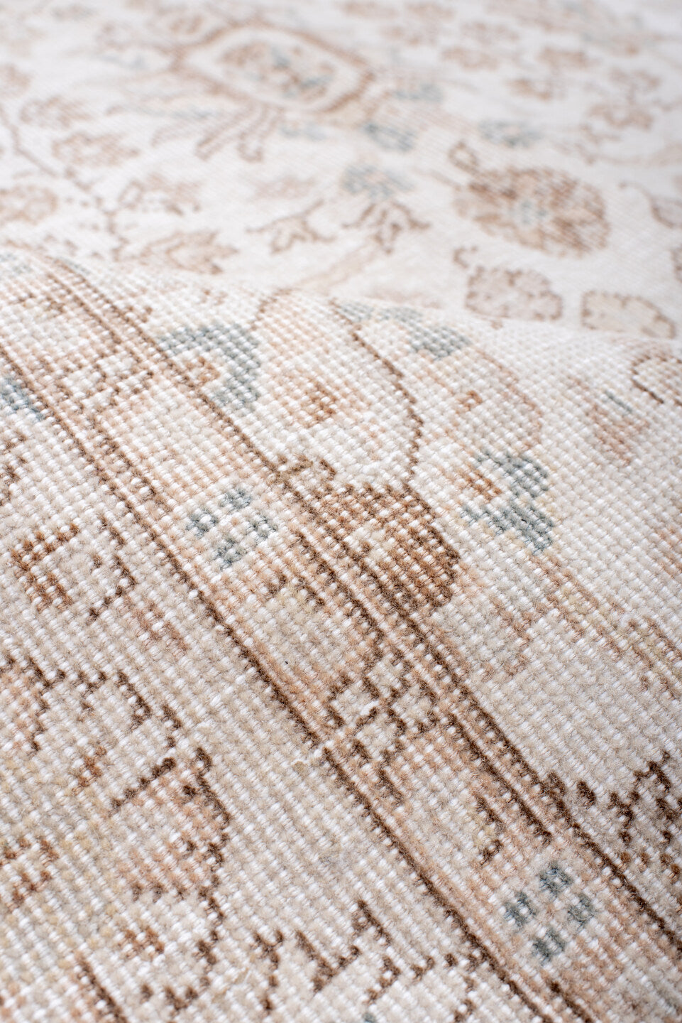 5' x 7' one-of-a-kind handmade antique Sparta rug. Color palette: ivory, beige, taupe, camel, pale blue, sand, gray